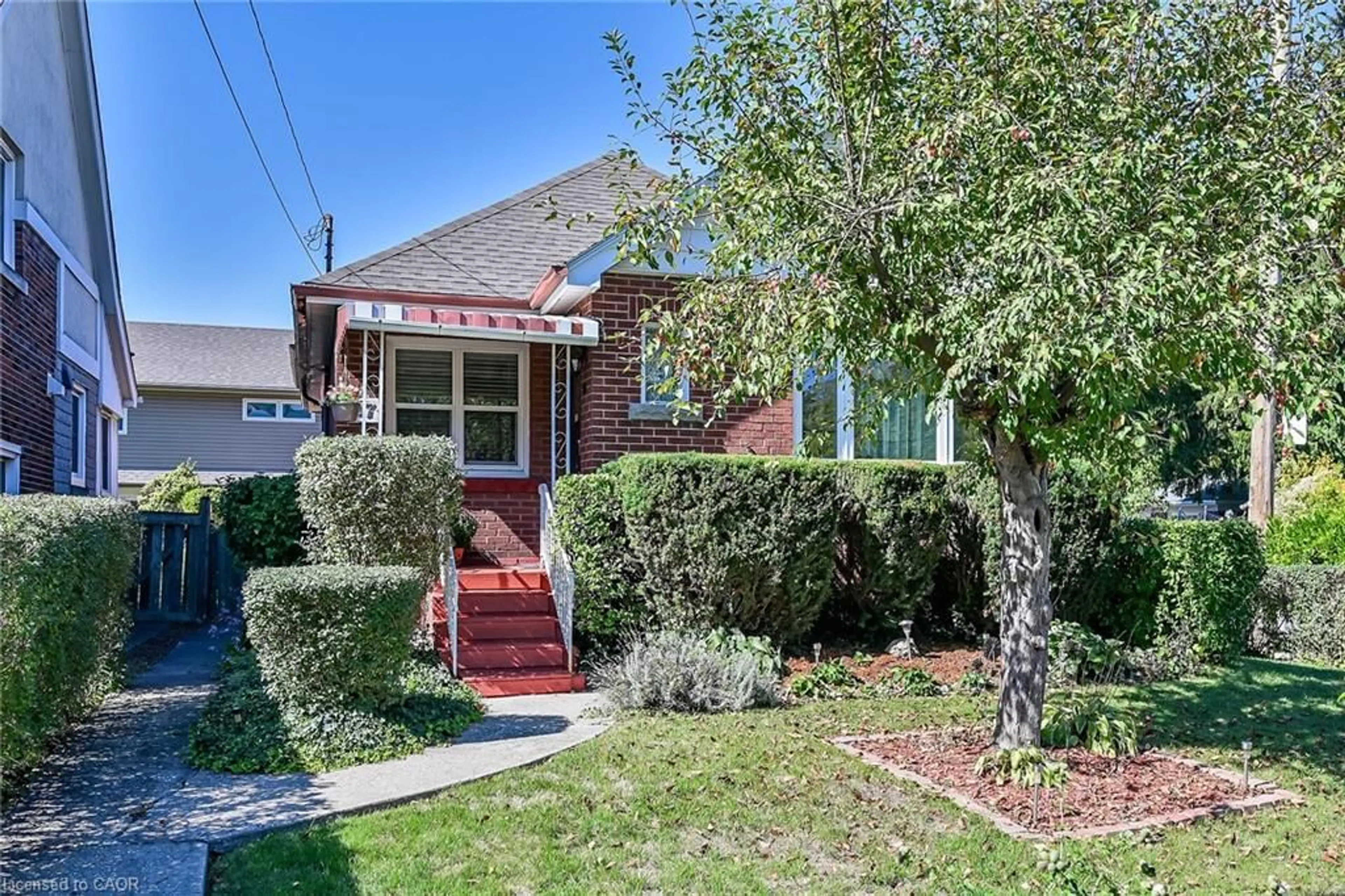 Home with brick exterior material, street for 27 Paradise Rd, Hamilton Ontario L8S 3S5