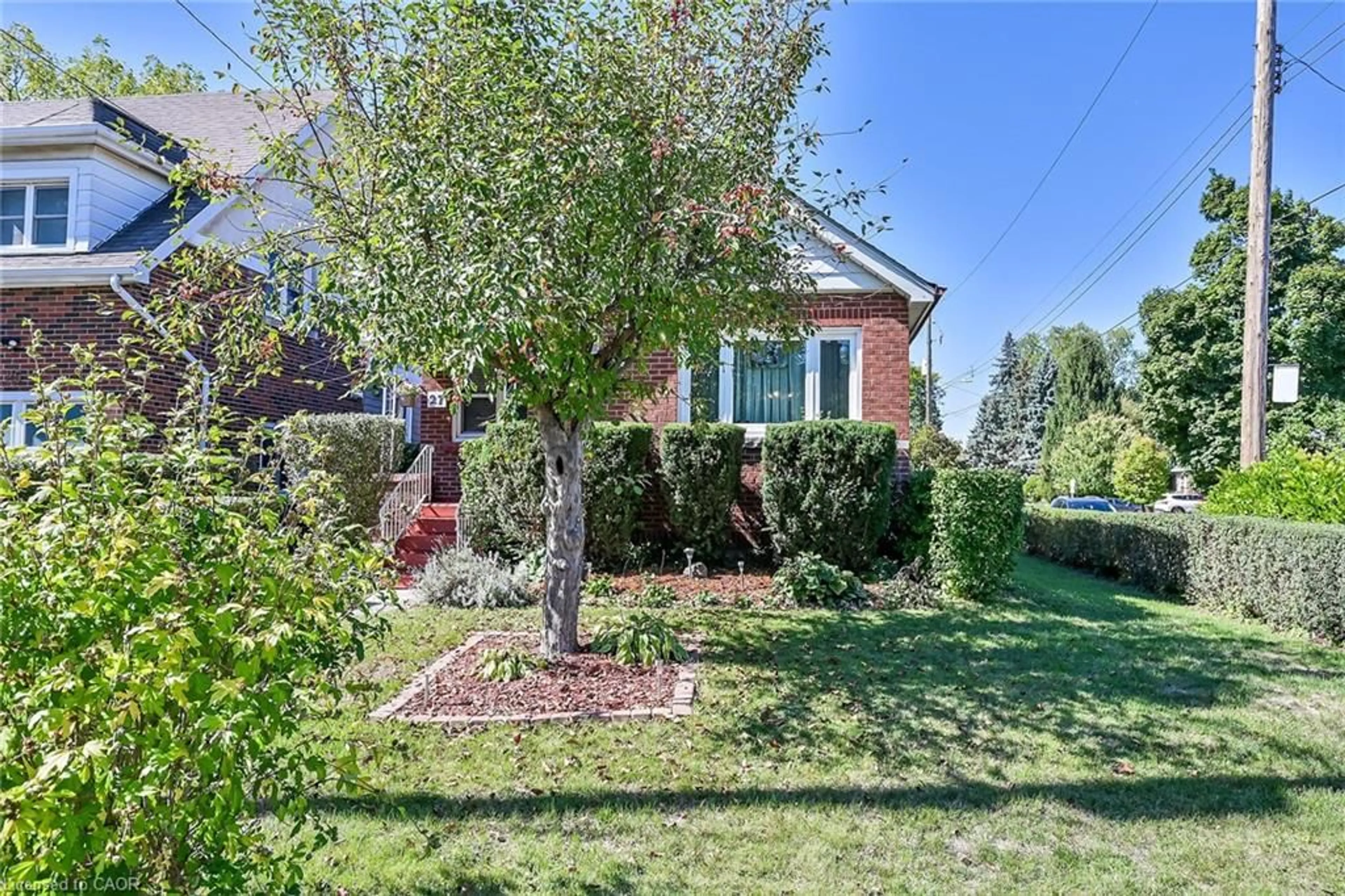 Home with brick exterior material, street for 27 Paradise Rd, Hamilton Ontario L8S 3S5