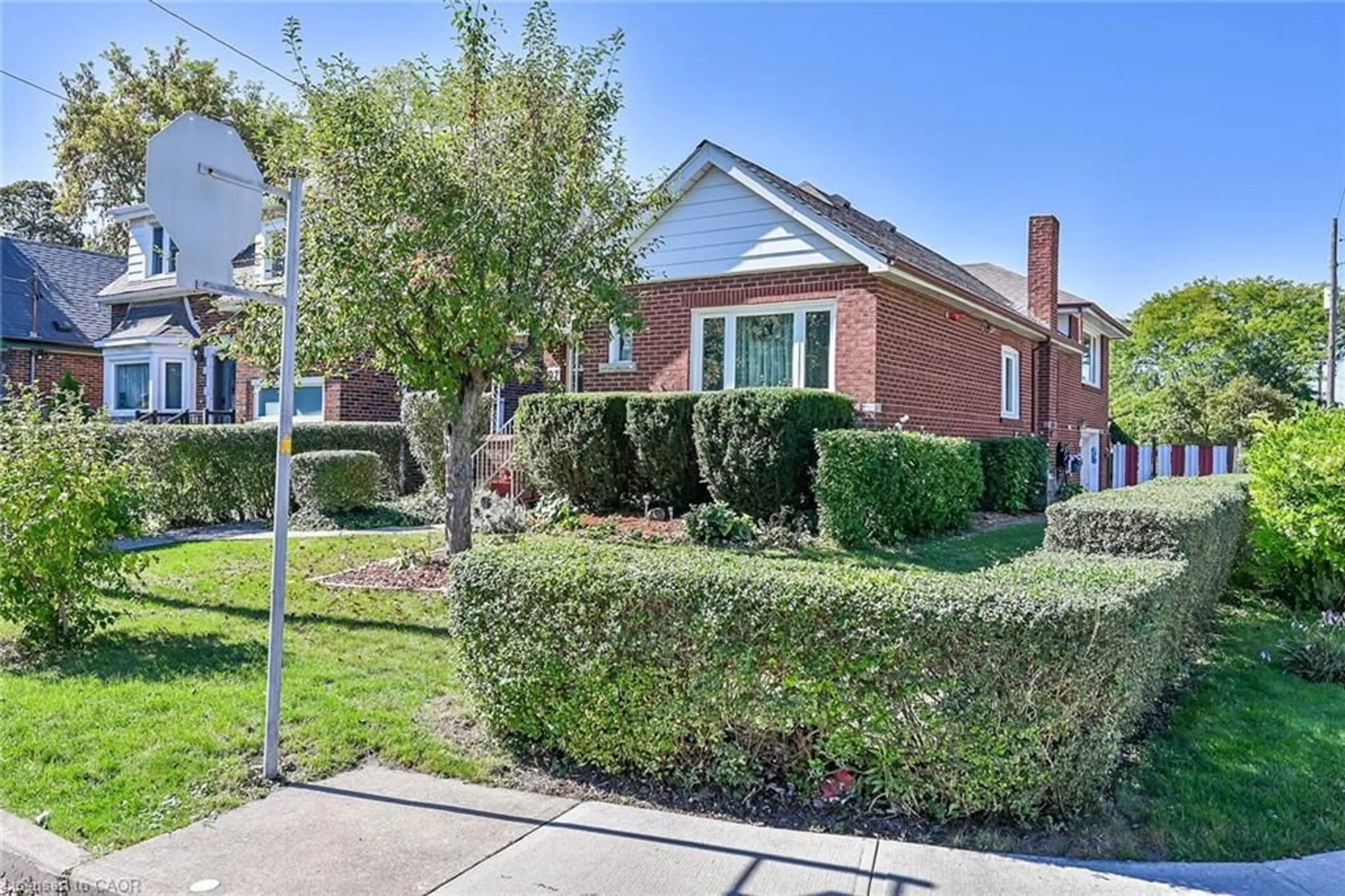 Home with brick exterior material, street for 27 Paradise Rd, Hamilton Ontario L8S 3S5