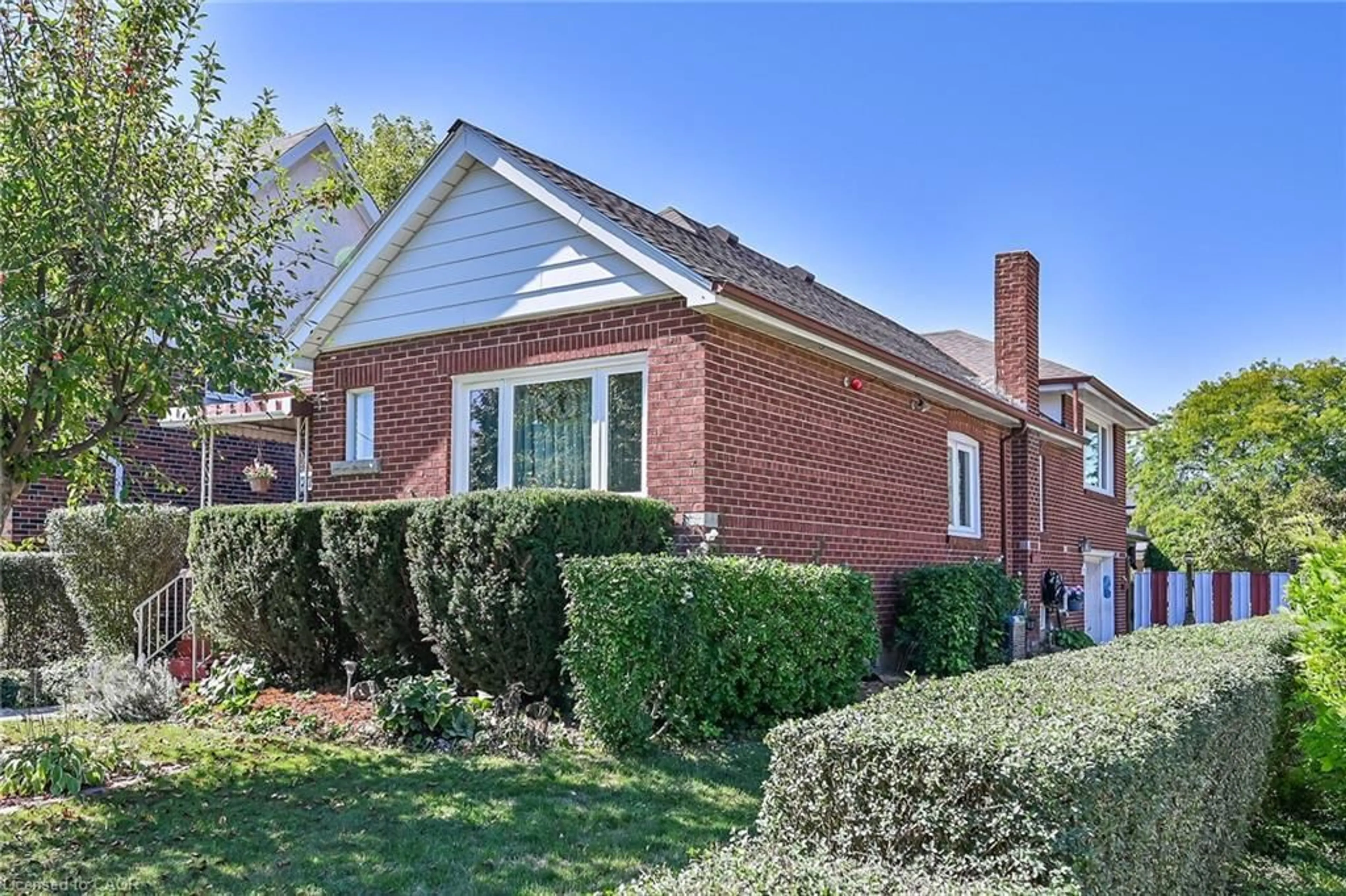 Home with brick exterior material, street for 27 Paradise Rd, Hamilton Ontario L8S 3S5