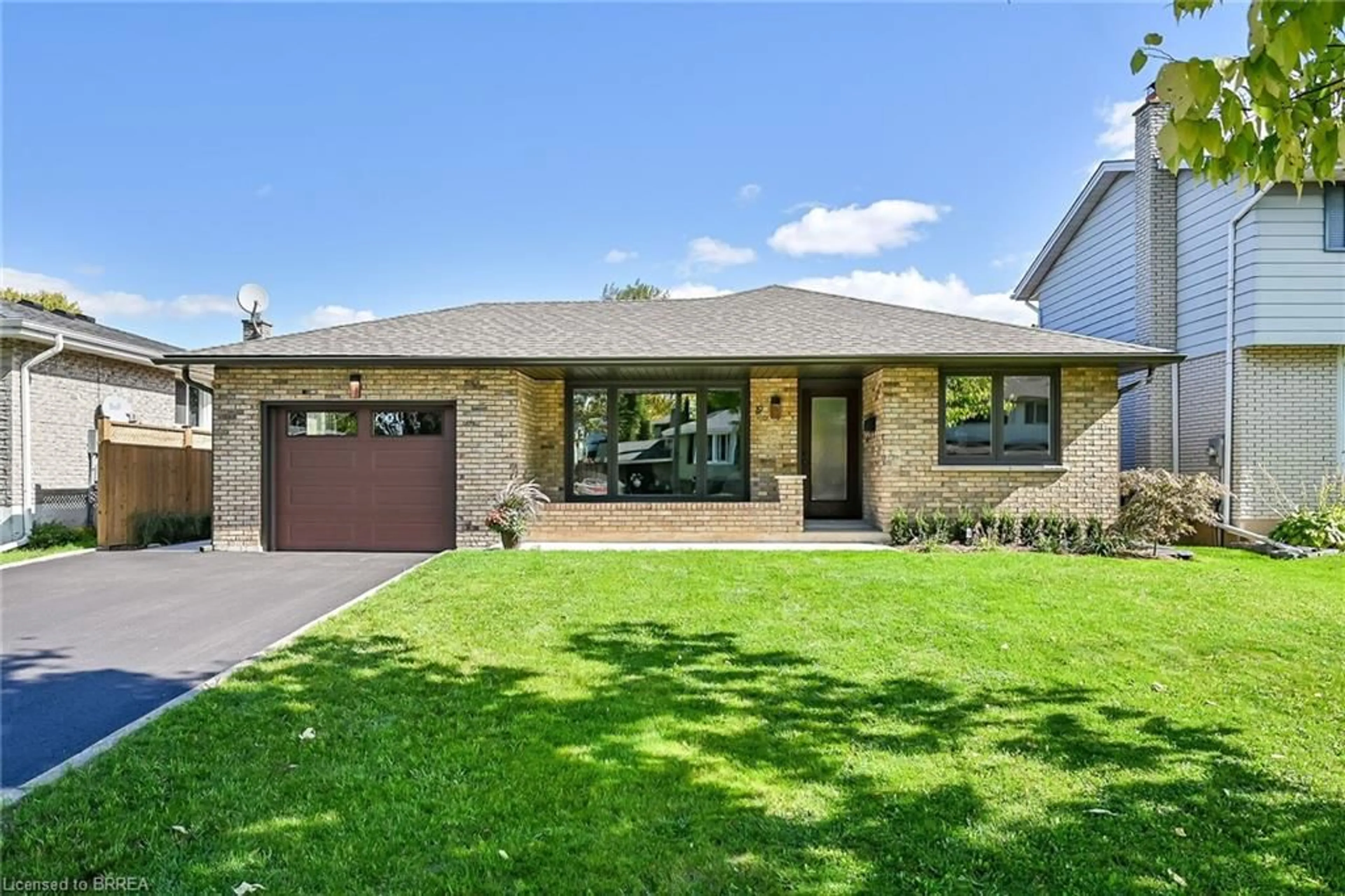 Home with brick exterior material, street for 19 Wildflower Lane, Brantford Ontario N3R 6B3