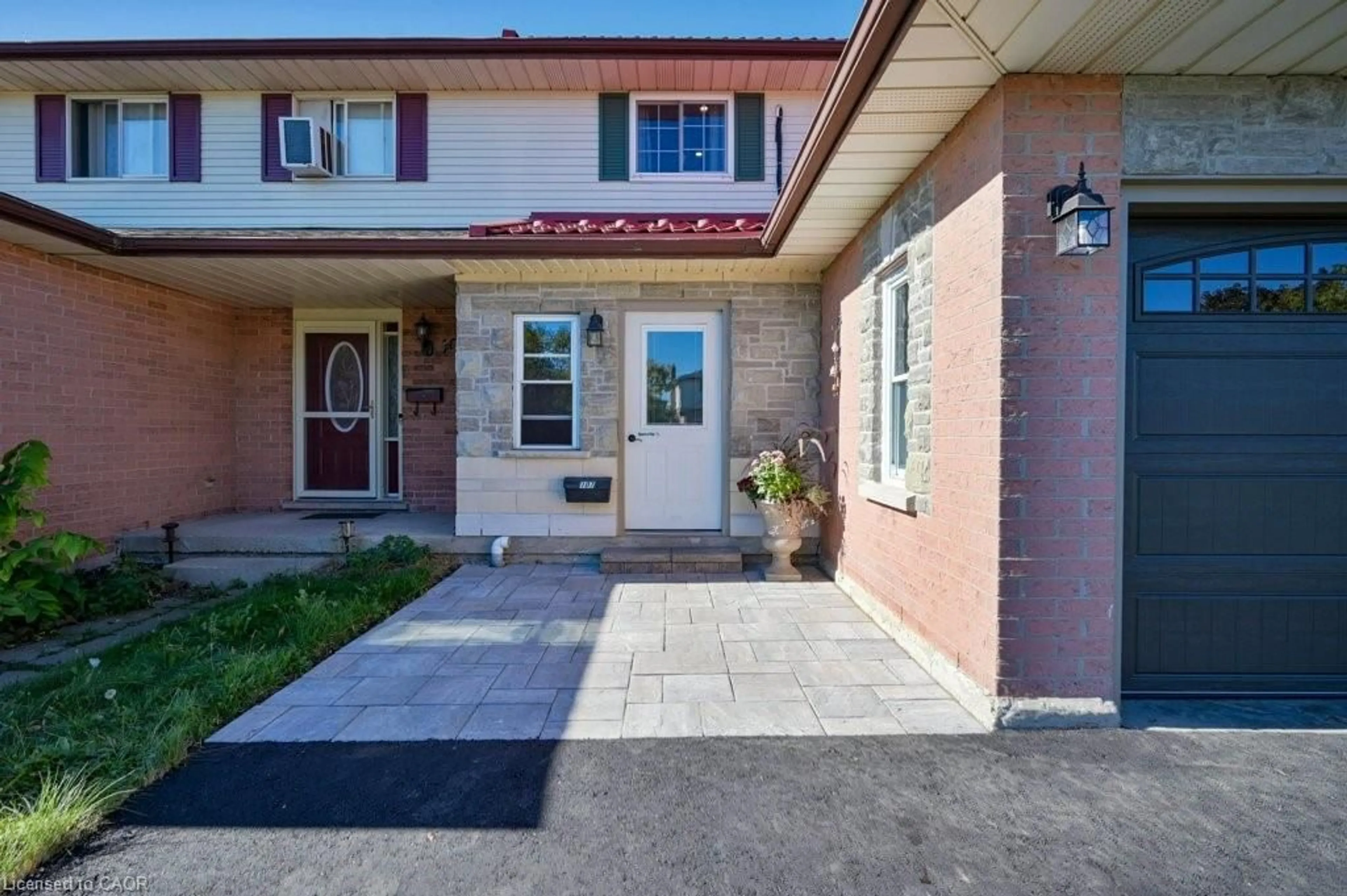 Home with brick exterior material, street for 107 Dinison Cres, Kitchener Ontario N2E 2S6
