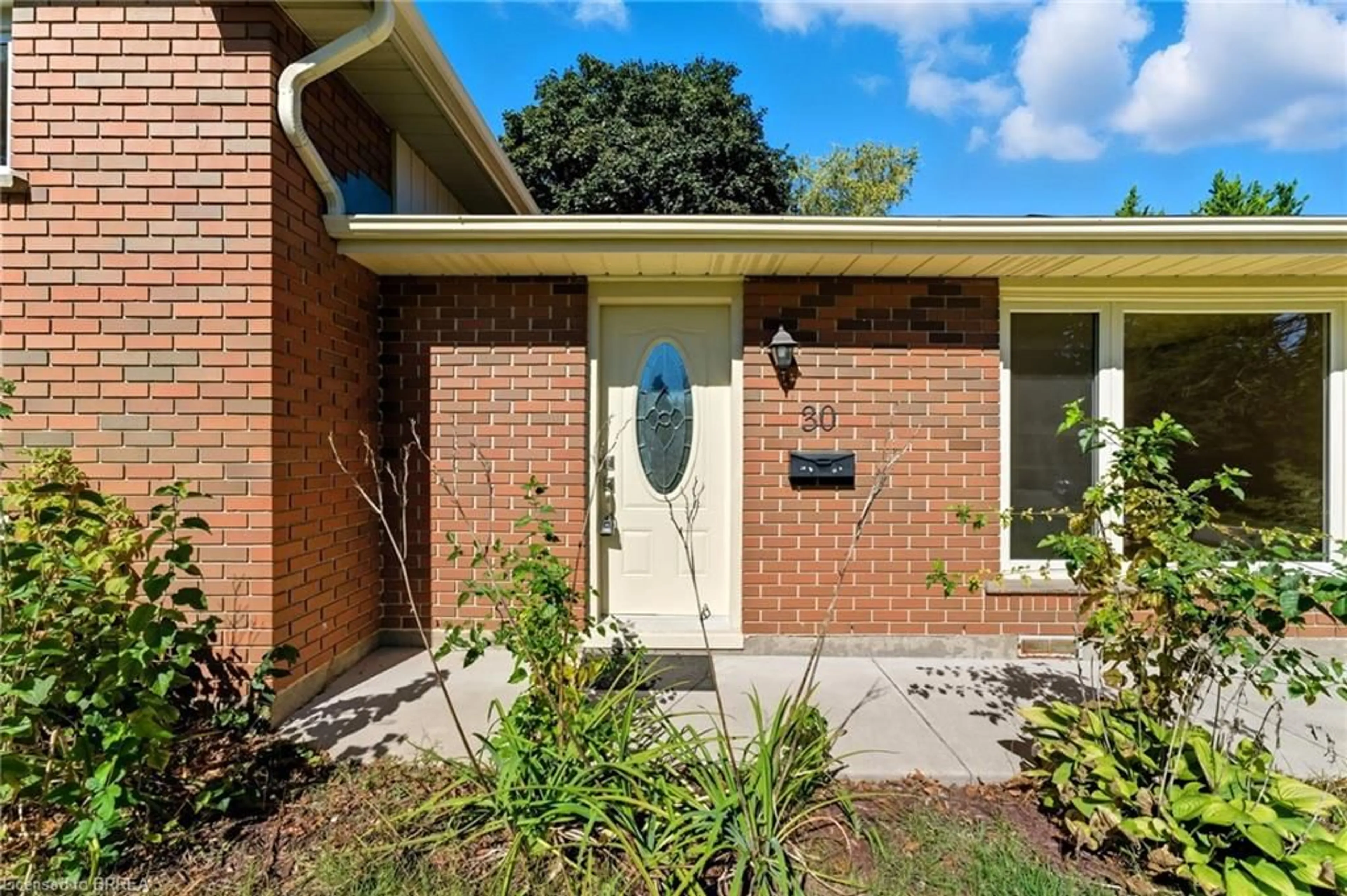 Home with brick exterior material, street for 30 Forsythe Ave, Brantford Ontario N3R 3L3