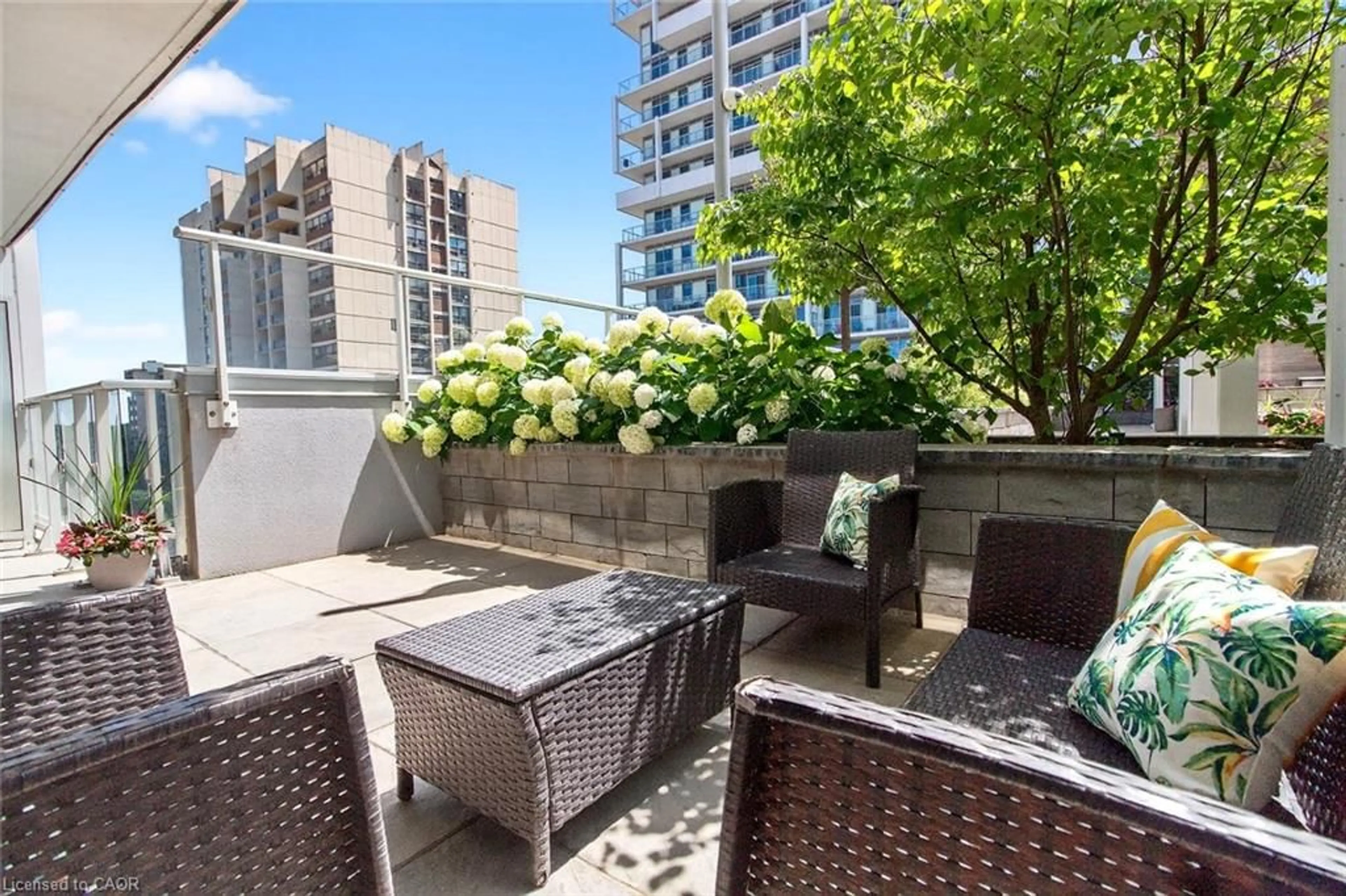 Patio, city buildings view from balcony for 65 Speers Rd #607, Oakville Ontario L6K 0J1
