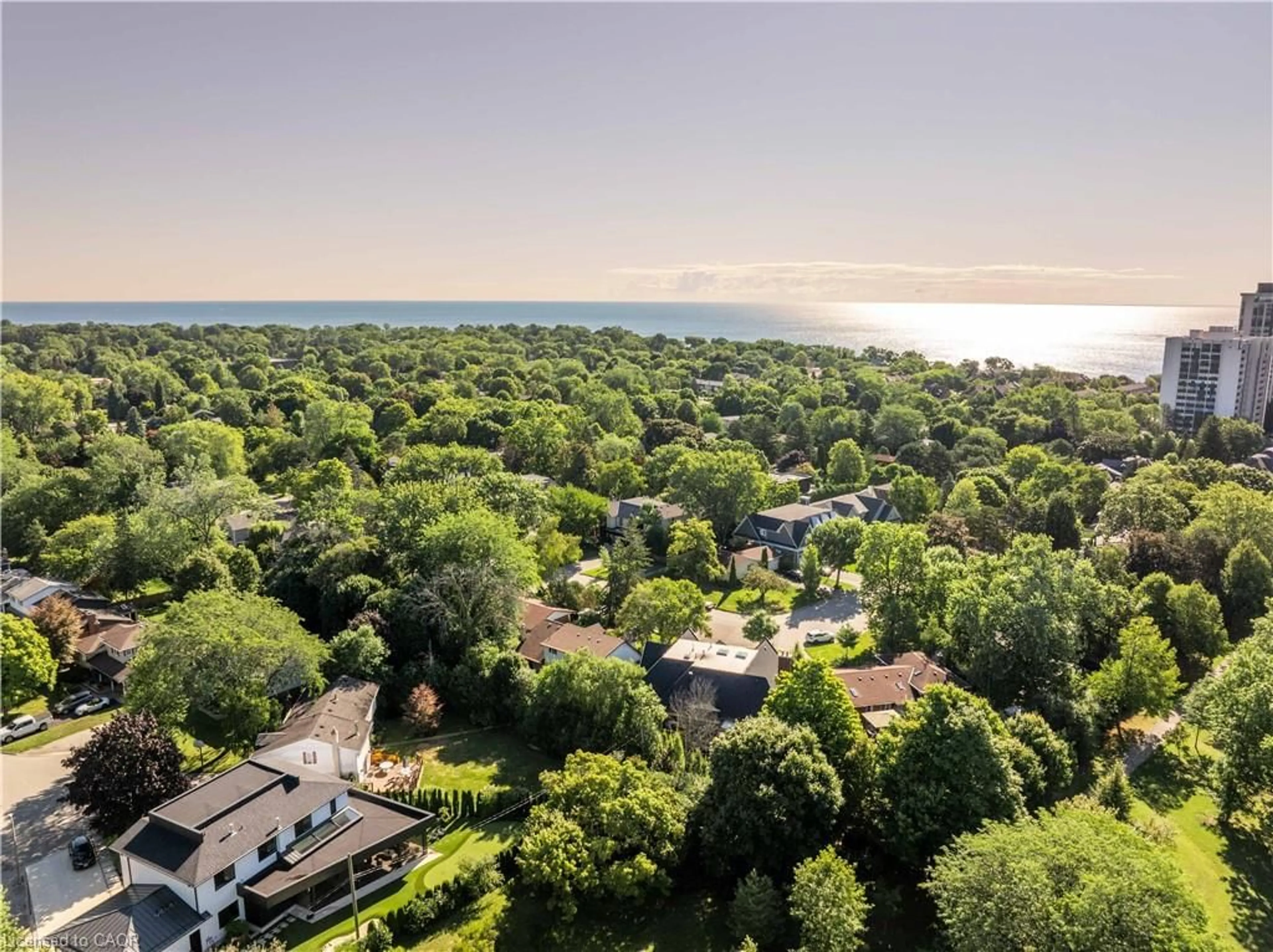 A pic from outside/outdoor area/front of a property/back of a property/a pic from drone, water/lake/river/ocean view for 144 Ulster Dr, Oakville Ontario L6L 3P2