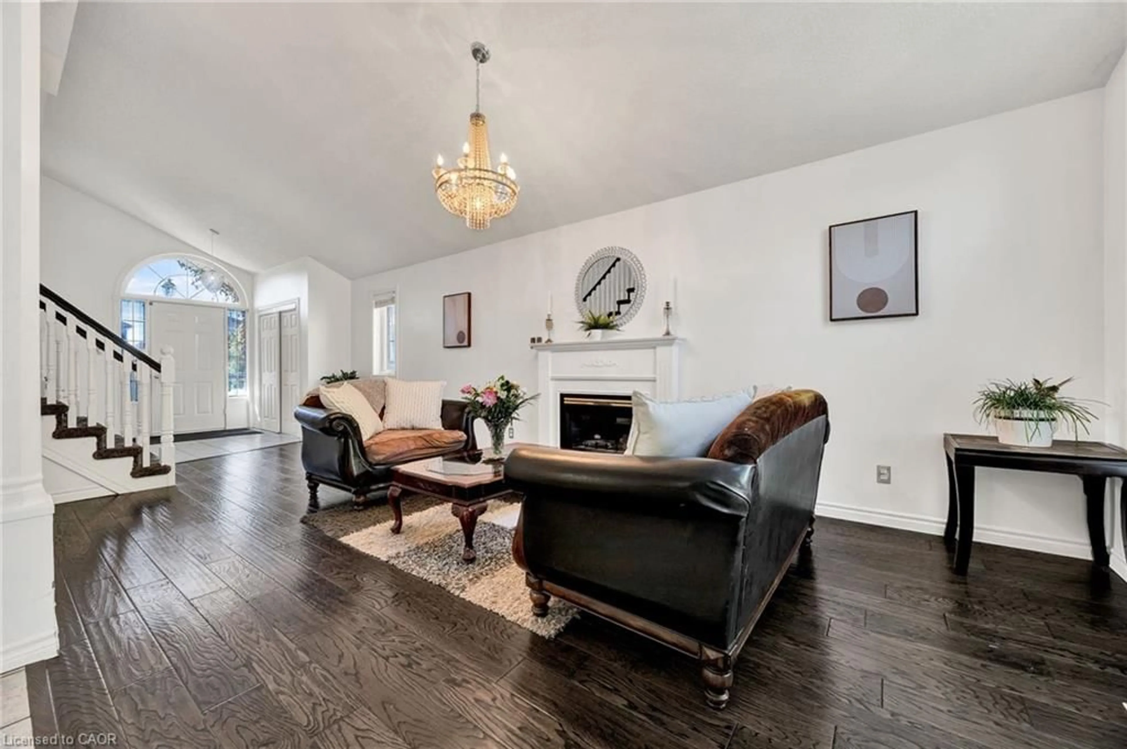 Living room with furniture, wood/laminate floor for 14 Keller Cres, Kitchener Ontario N2N 3M7