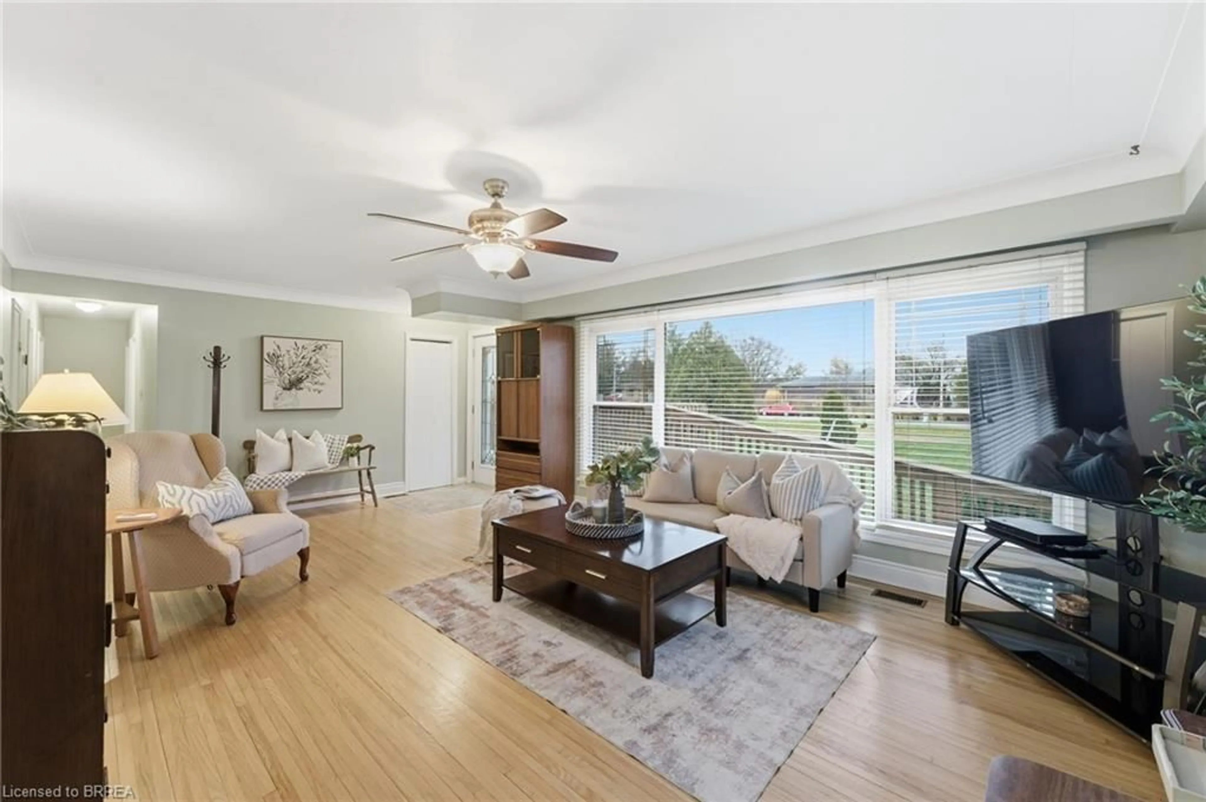 Living room with furniture, wood/laminate floor for 929 Concession 6 Townsend, Waterford Ontario N0E 1Y0