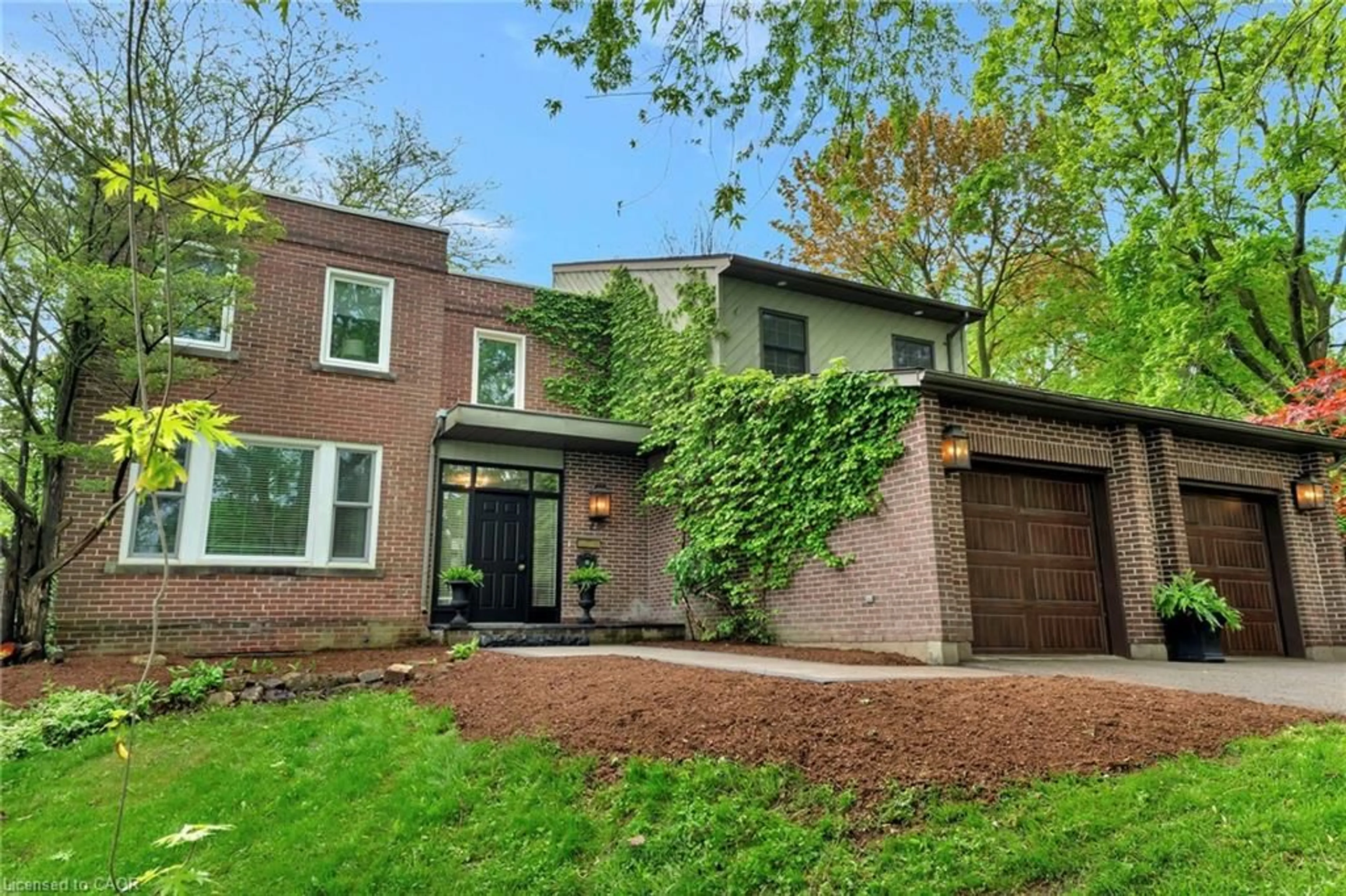 Home with brick exterior material, street for 73 Lemon St, Guelph Ontario N1E 2H4