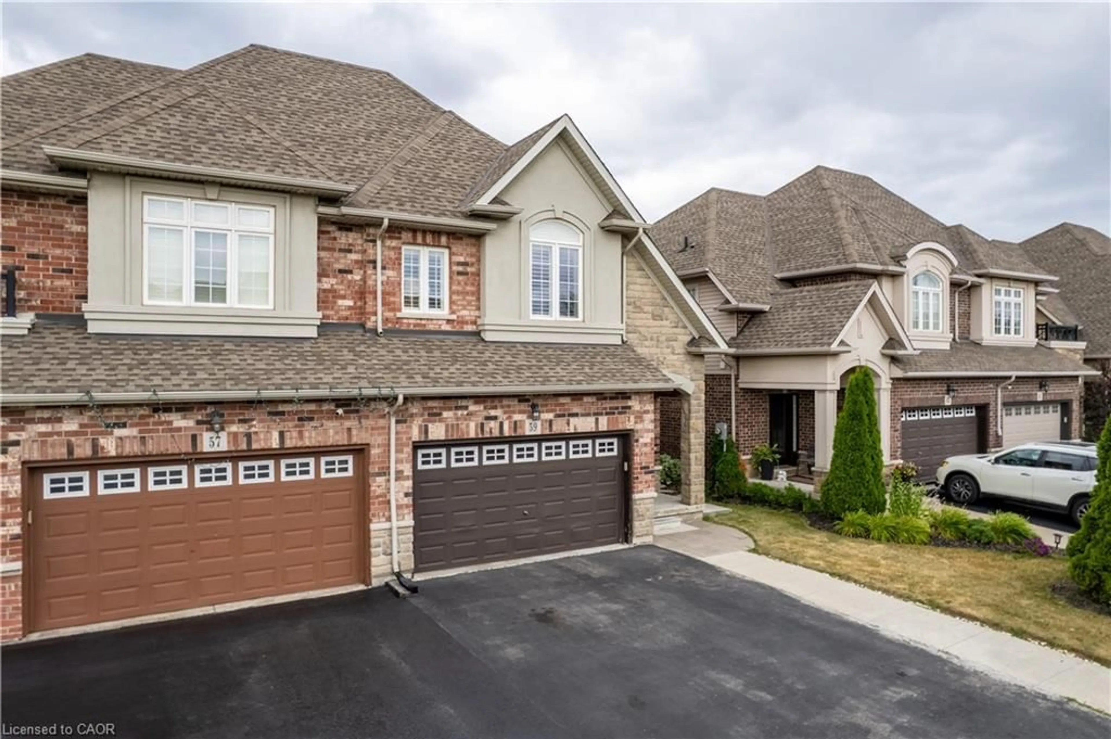 Home with brick exterior material, street for 59 Galileo Dr, Stoney Creek Ontario L8E 0H1
