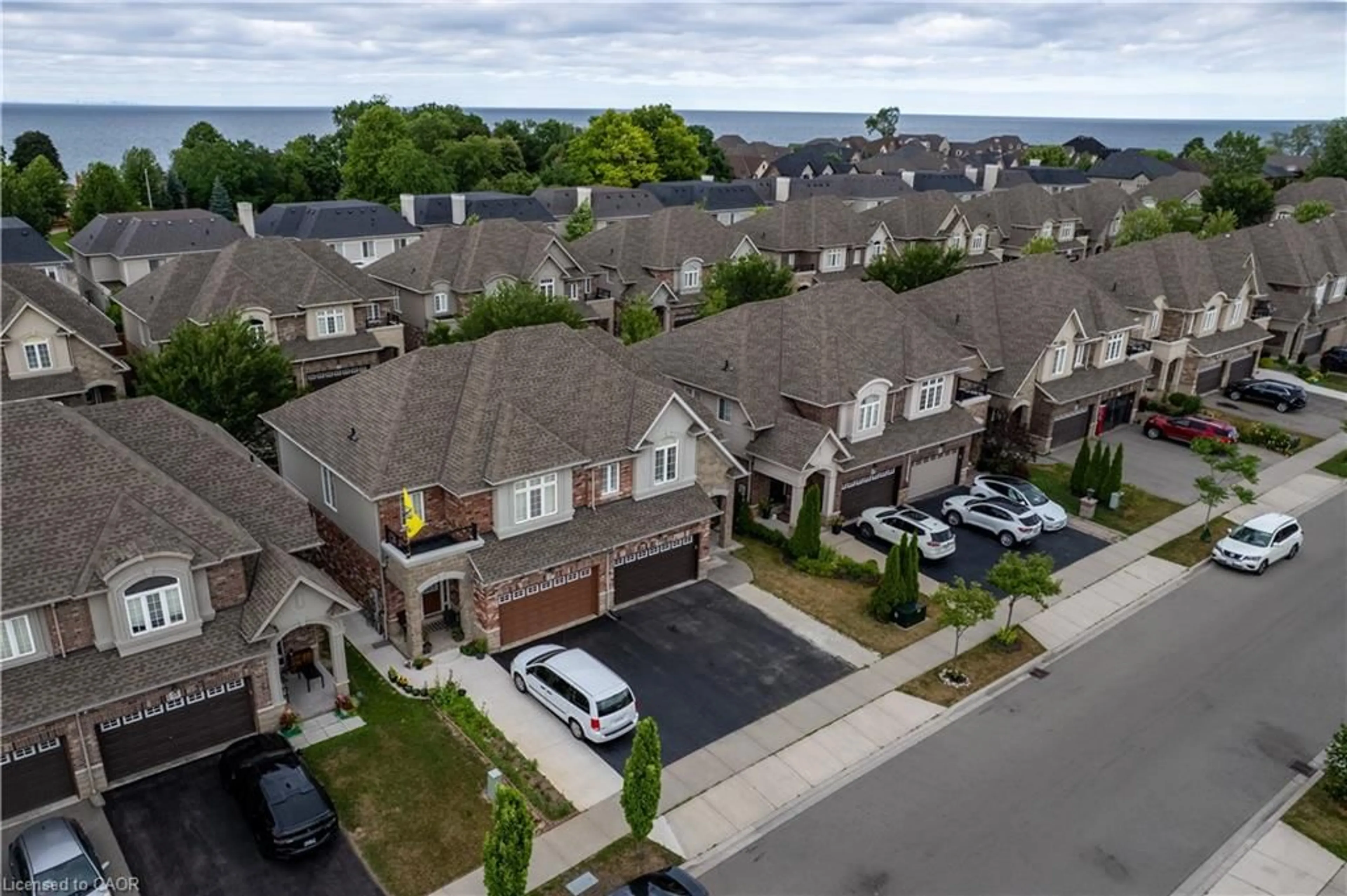 A pic from outside/outdoor area/front of a property/back of a property/a pic from drone, street for 59 Galileo Dr, Stoney Creek Ontario L8E 0H1