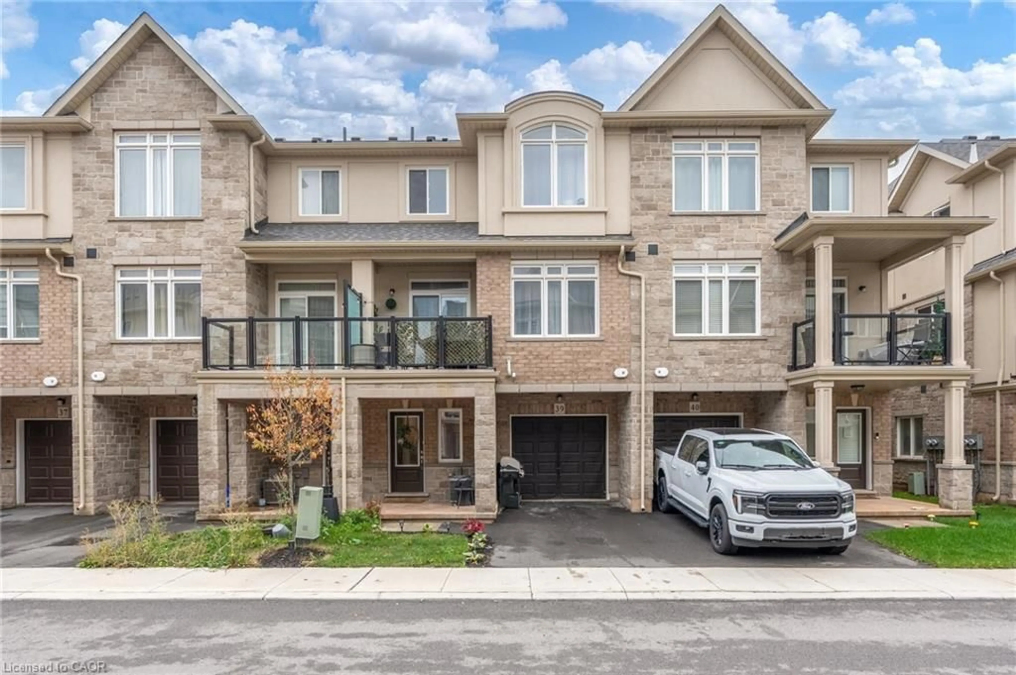Home with brick exterior material, street for 40 Zinfandel Dr #39, Stoney Creek Ontario L8E 0L1