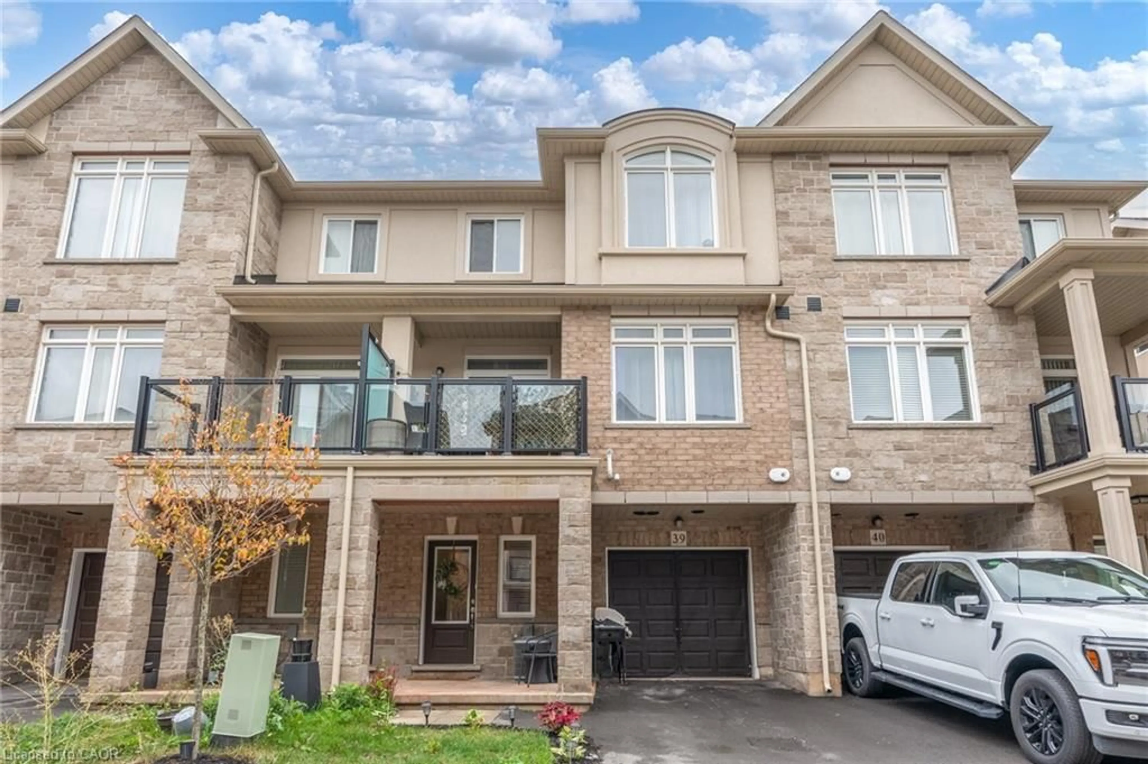 Home with brick exterior material, street for 40 Zinfandel Dr #39, Stoney Creek Ontario L8E 0L1