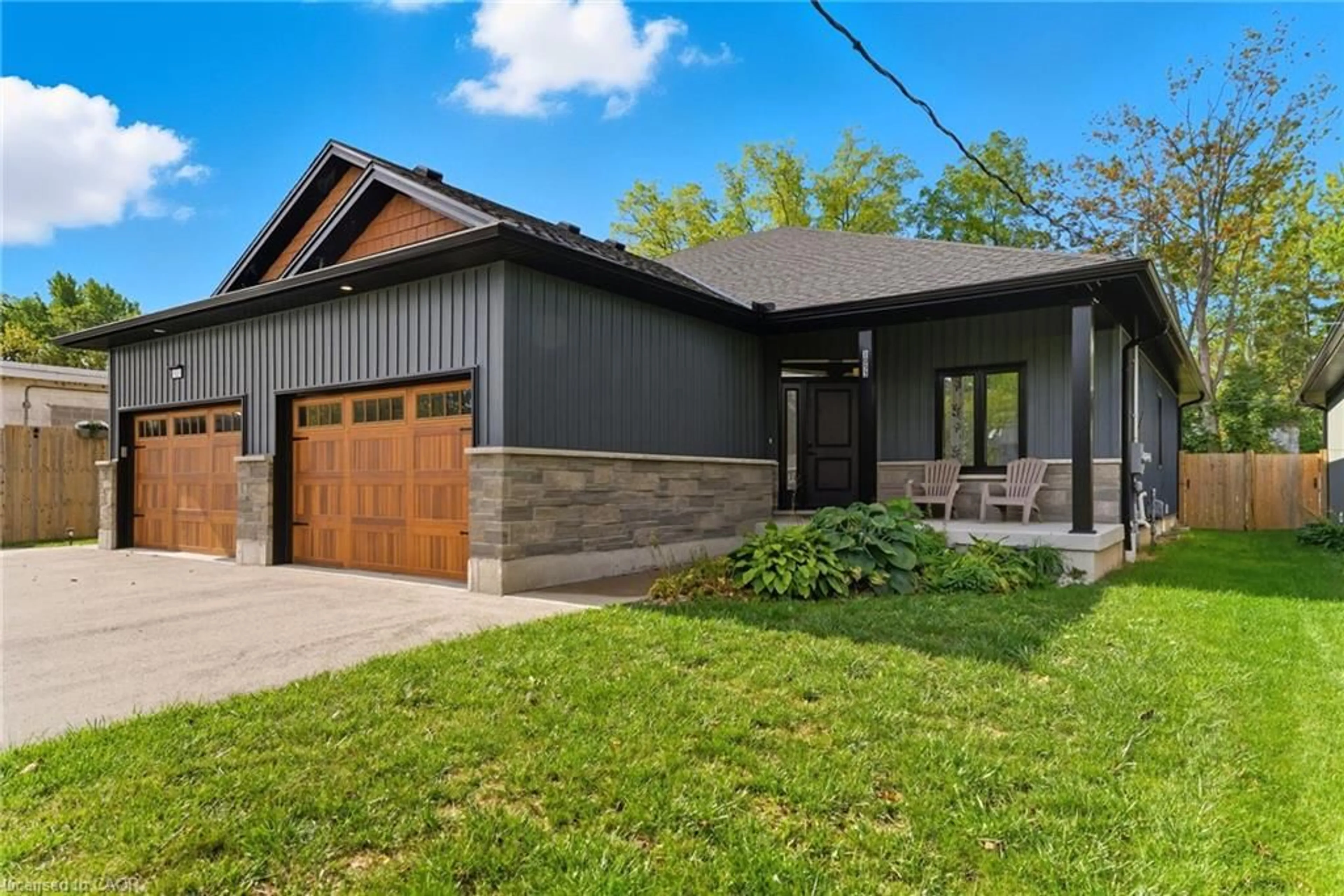 Home with brick exterior material, street for 1053 Bay St, Port Rowan Ontario N0E 1M0