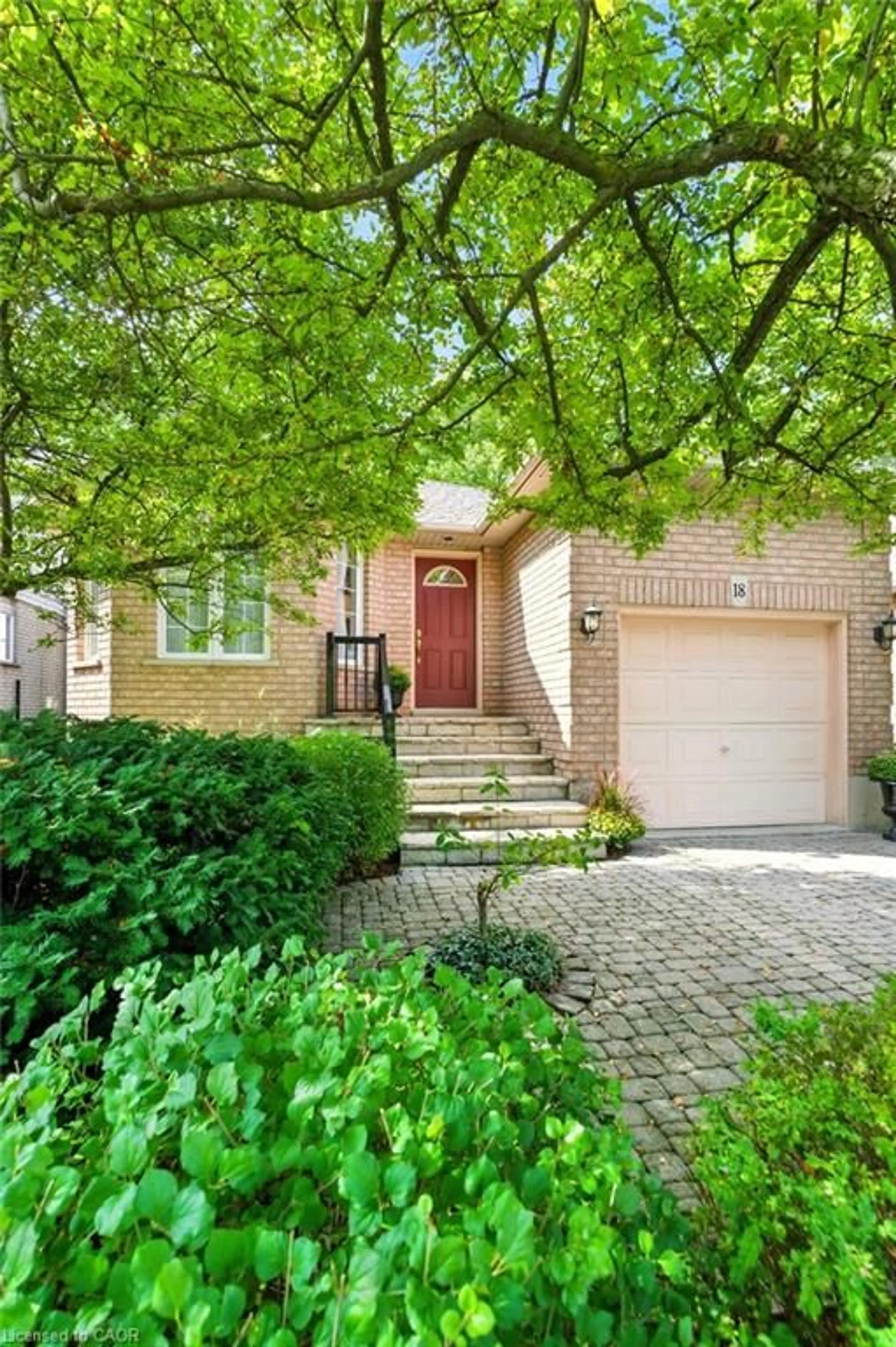 Home with brick exterior material, street for 18 Naples Blvd, Hamilton Ontario L9B 2J2