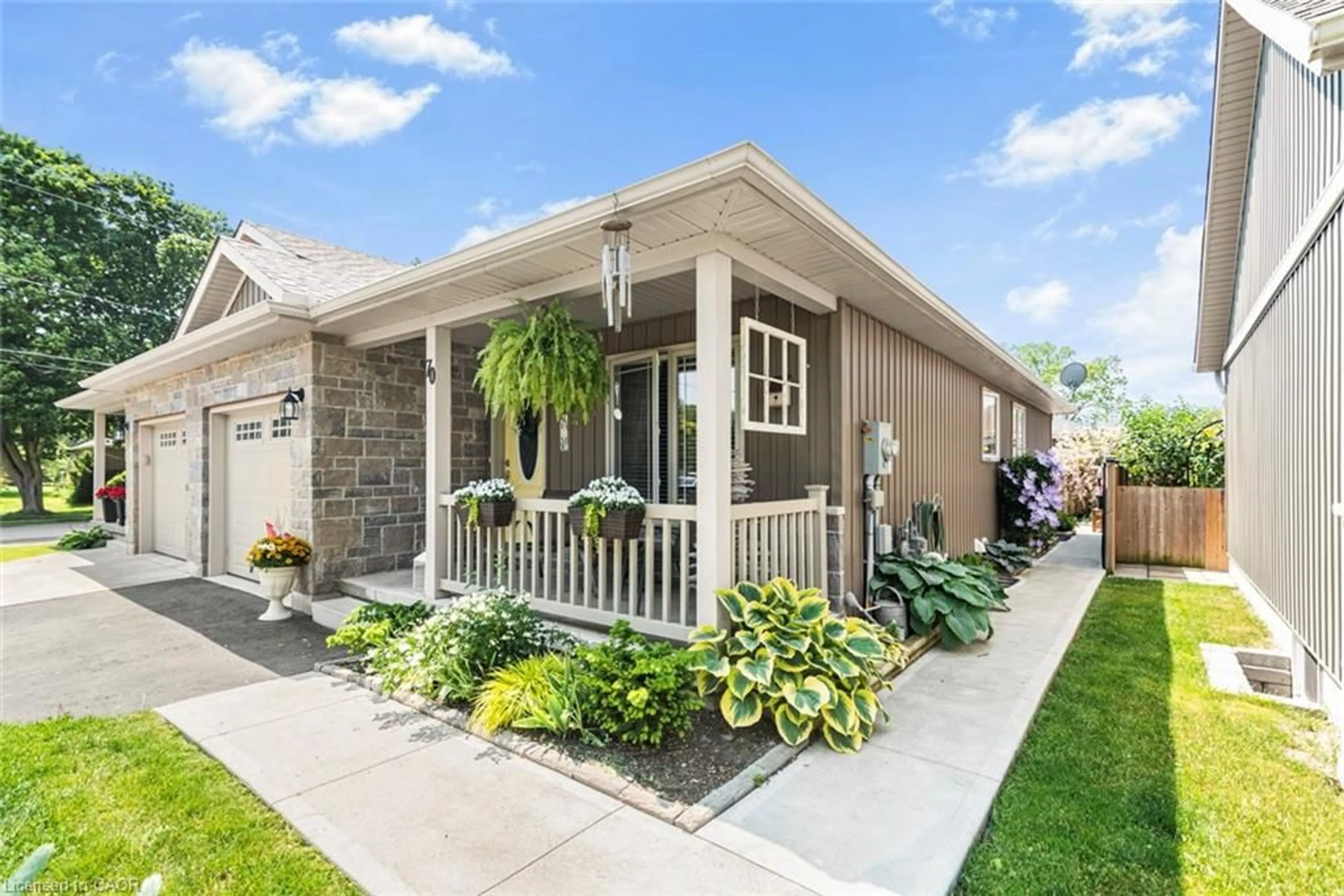 Home with vinyl exterior material, street for 70 Postma Dr, Dunneville Ontario N1A 0B2