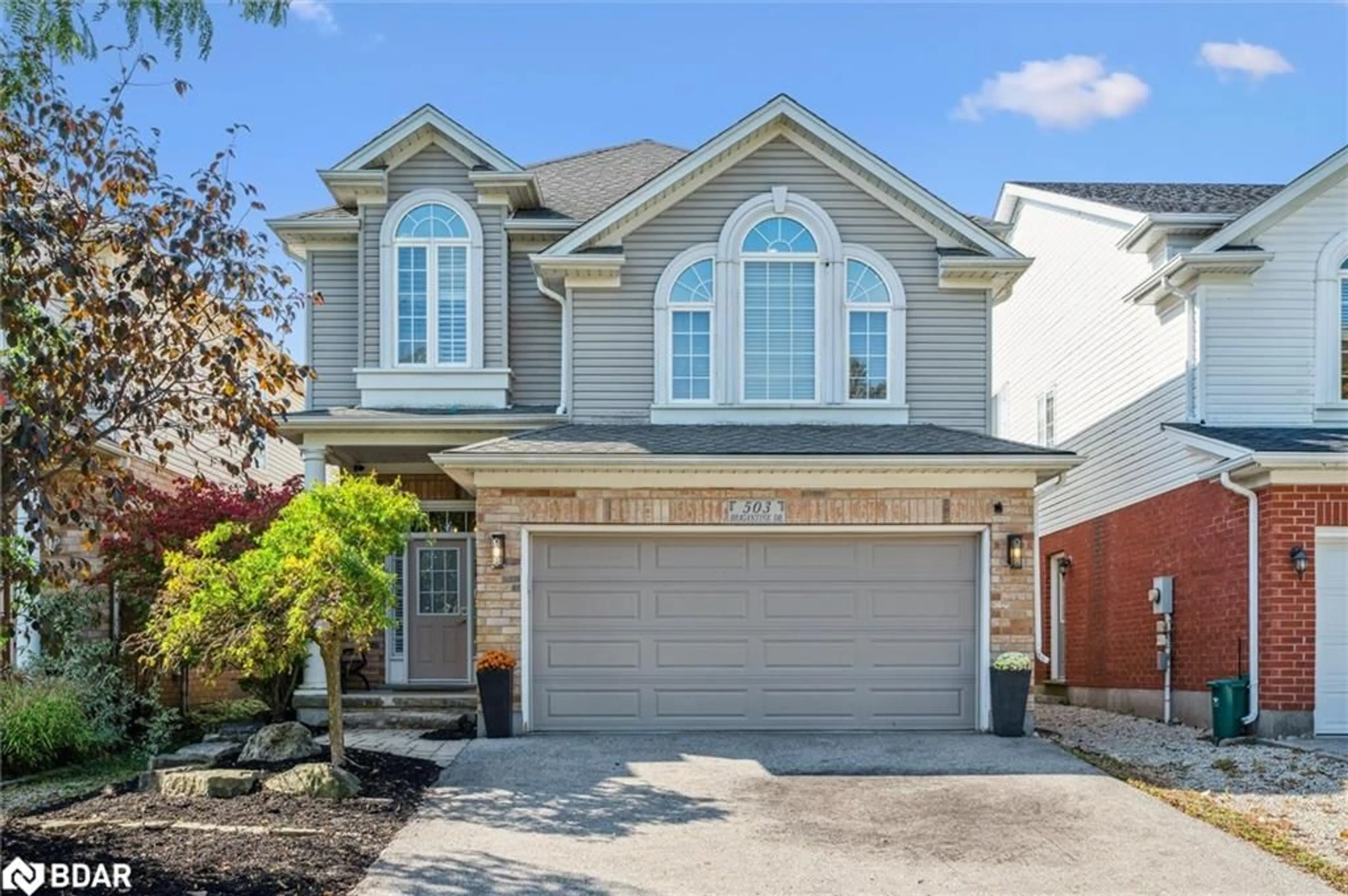 Home with vinyl exterior material, street for 503 Brigantine Dr, Waterloo Ontario N2K 4B7