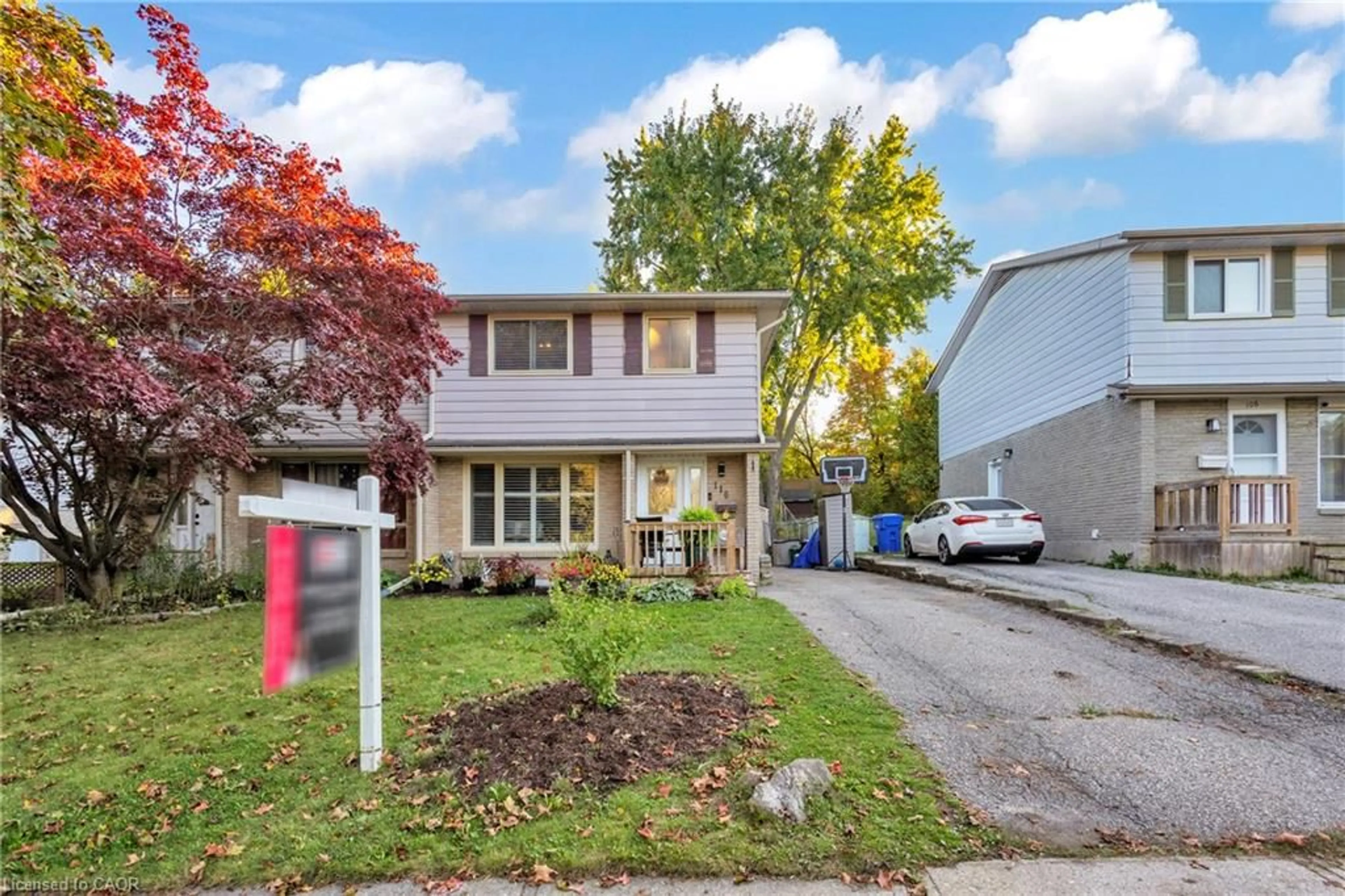 Home with vinyl exterior material, street for 110 Shadeland Cres, Kitchener Ontario N2M 2H9