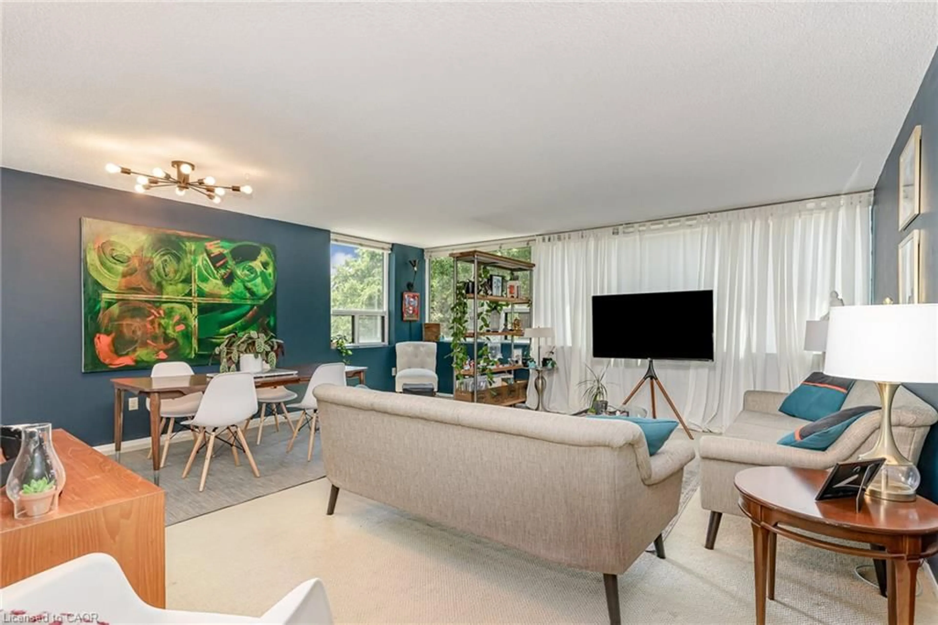 Living room with furniture, unknown for 120 Duke St #206, Hamilton Ontario L8P 4T1