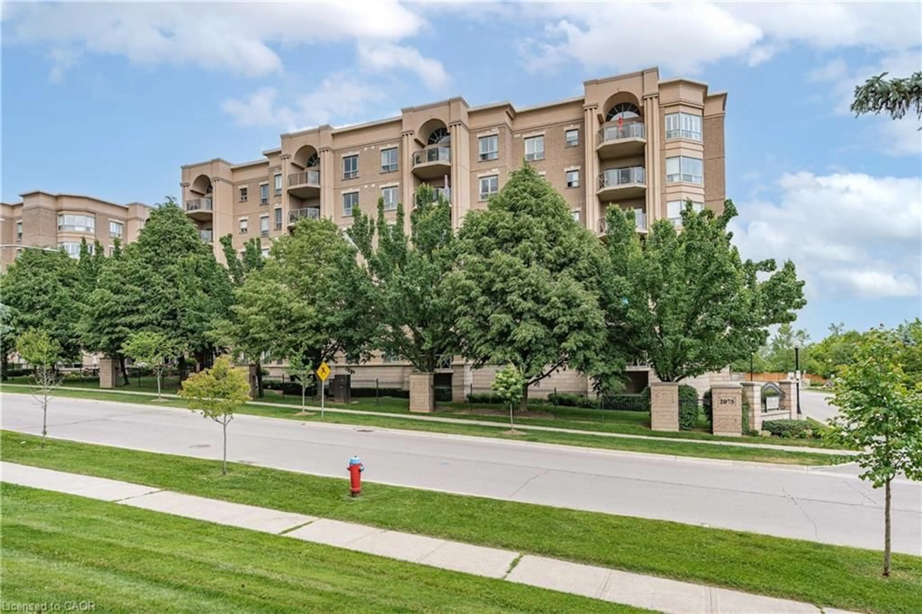 A pic from outside/outdoor area/front of a property/back of a property/a pic from drone, unknown for 2075 Amherst Heights Dr #506, Burlington Ontario L7P 5B8