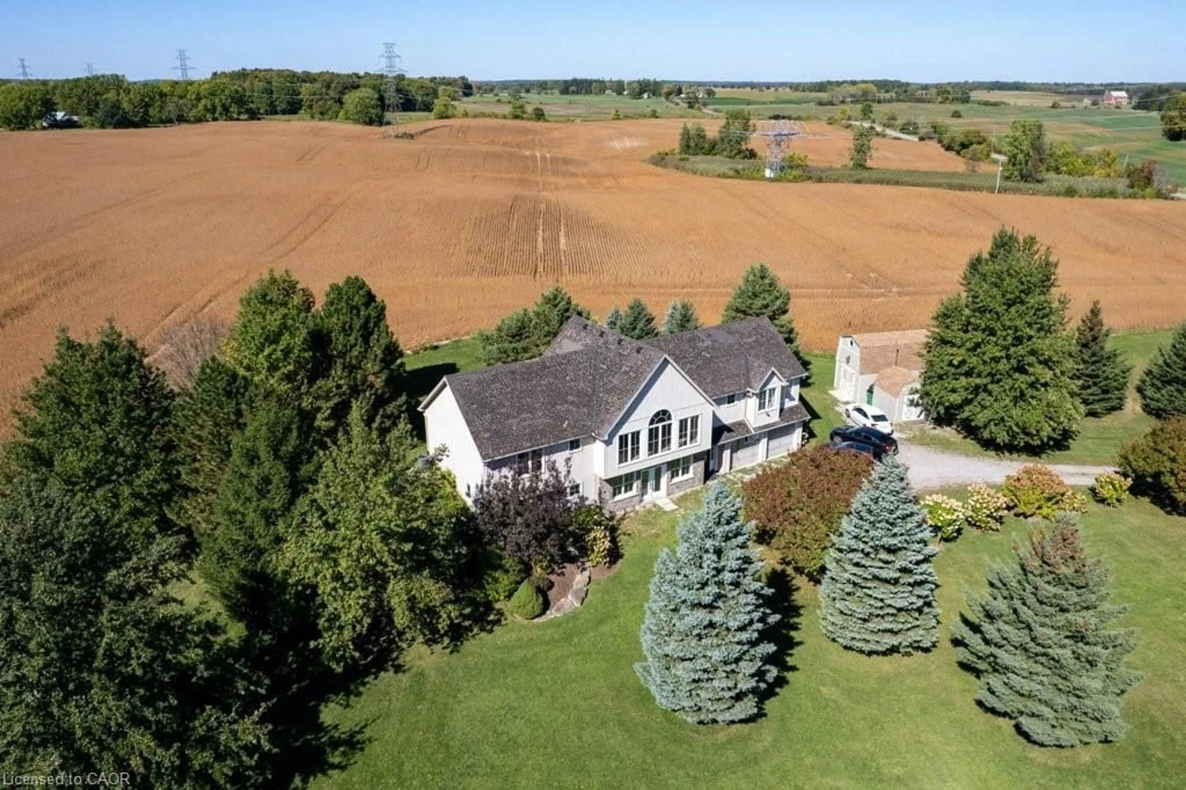 A pic from outside/outdoor area/front of a property/back of a property/a pic from drone, unknown for 407 Harrisburg Rd, Troy Ontario L0R 2B0