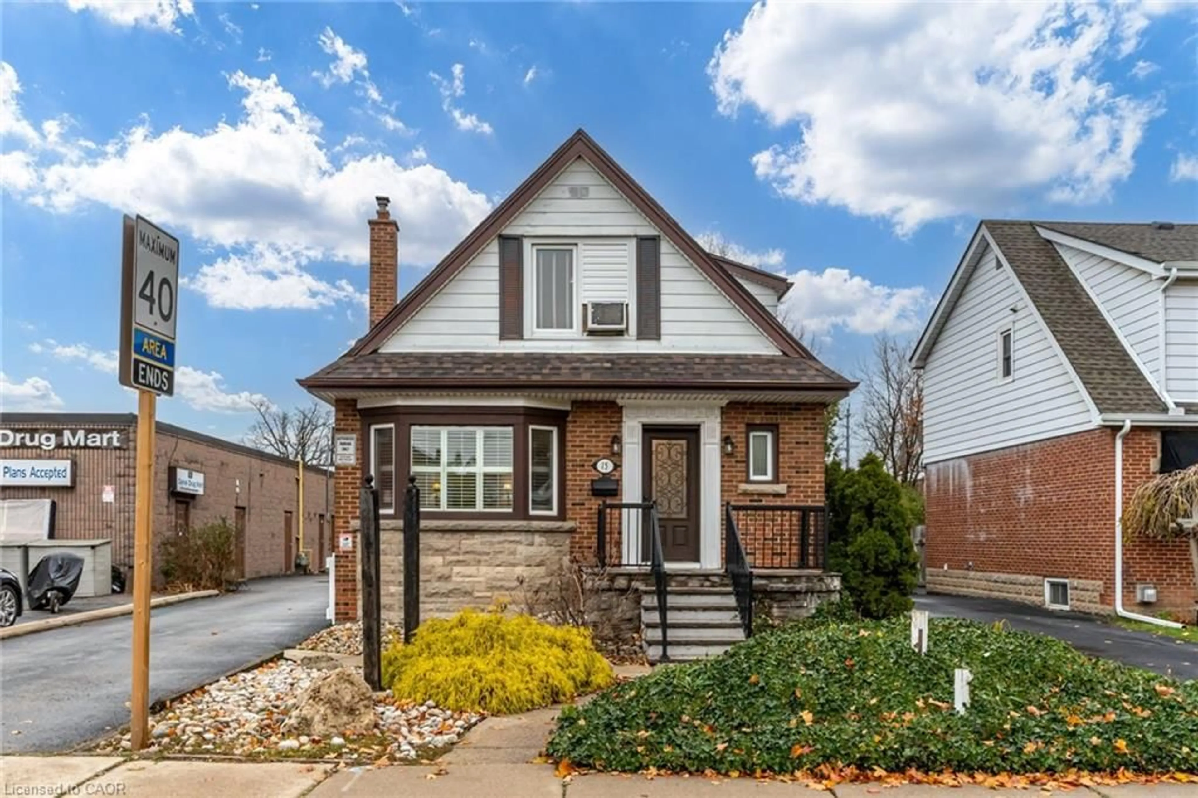 Home with brick exterior material, street for 15 Empress Ave, Hamilton Ontario L9A 1M1