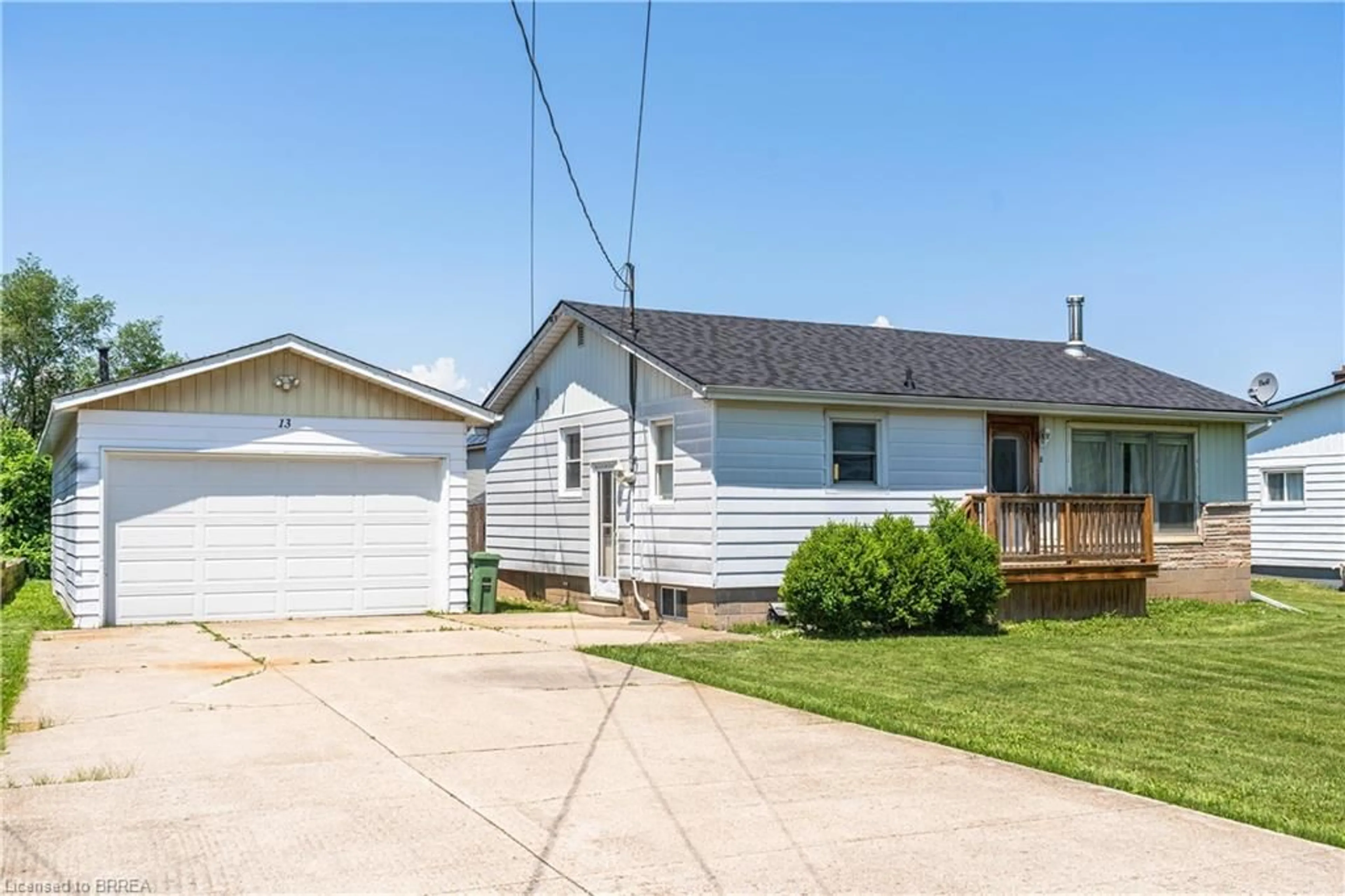 Home with vinyl exterior material, street for 13 West Ave, Stoney Creek Ontario L8E 5L5