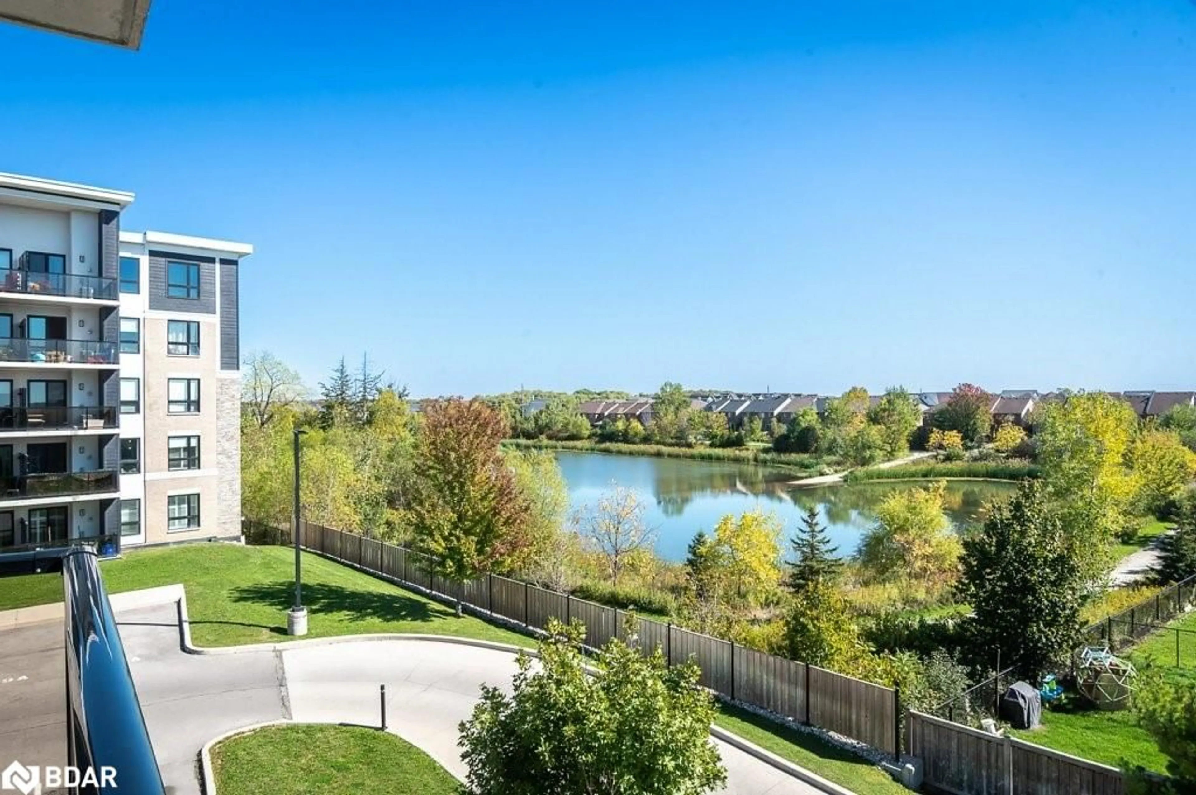 A pic from outside/outdoor area/front of a property/back of a property/a pic from drone, water/lake/river/ocean view for 650 Sauve St #302, Milton Ontario L9T 9A8