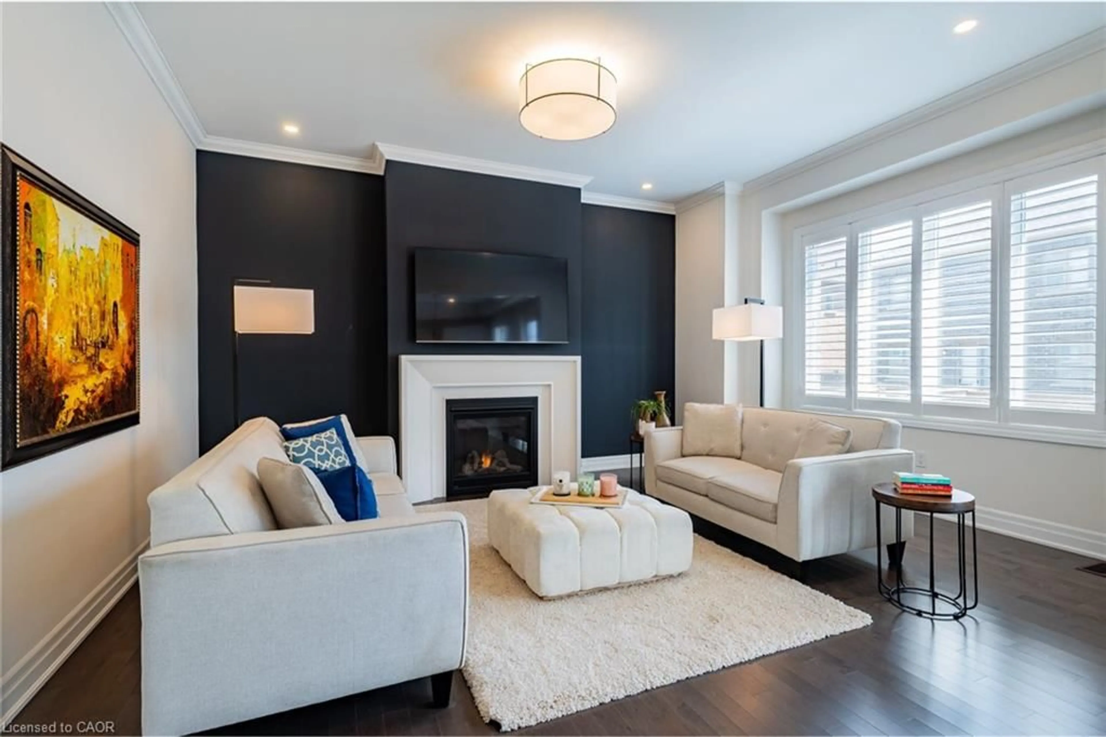 Living room with furniture, wood/laminate floor for 66 Merlin St, Oakville Ontario L6H 0Z4