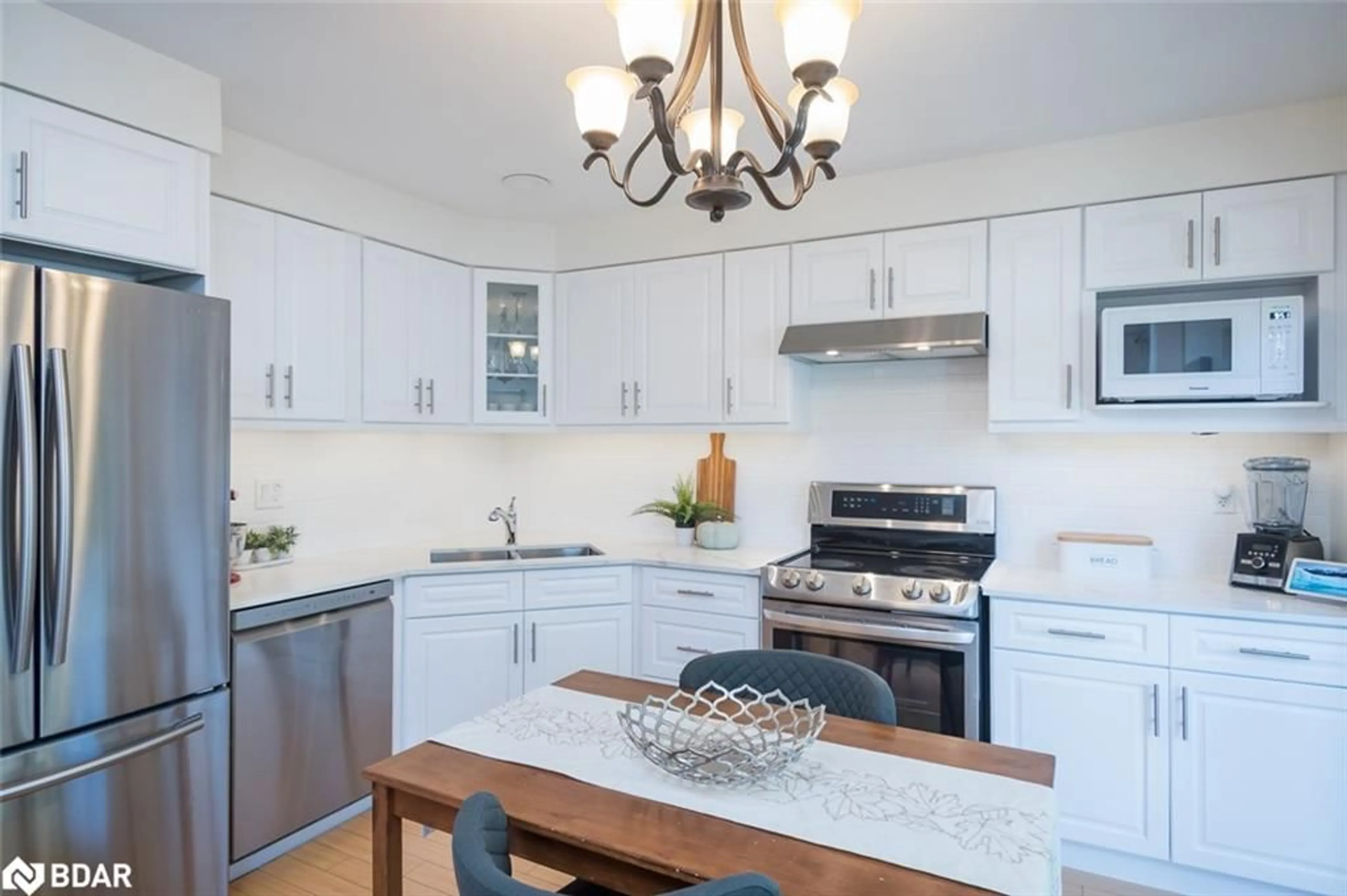 Open concept kitchen, unknown for 698 Edwards Ave, Milton Ontario L9T 6B4