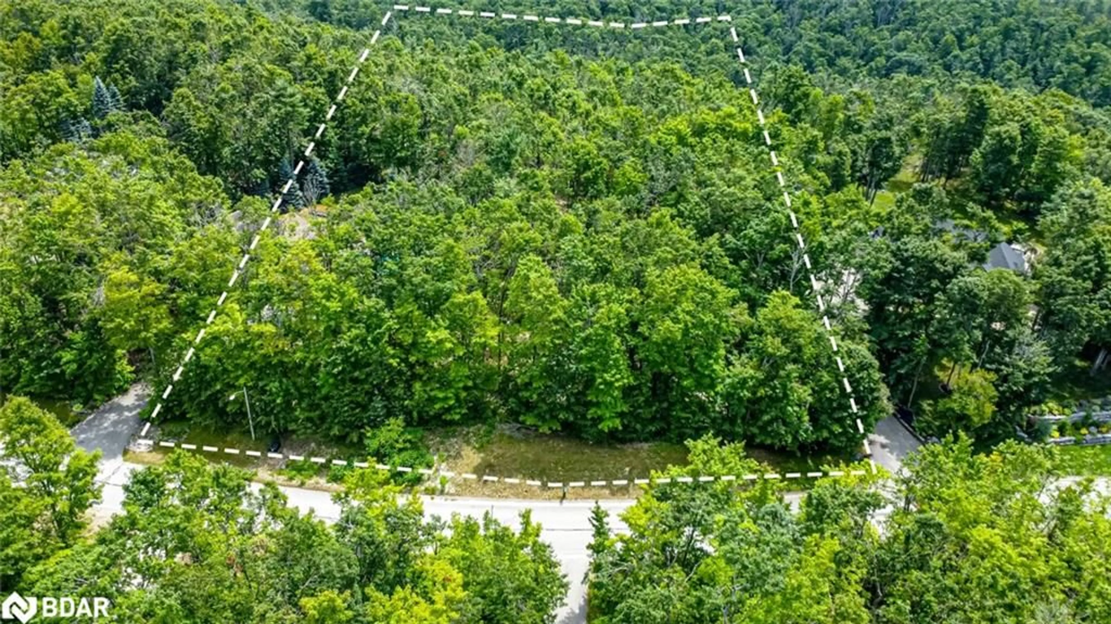 A pic from outside/outdoor area/front of a property/back of a property/a pic from drone, forest/trees view for 17 Maple Ridge Rd, Oro-Medonte Ontario L0L 2L0