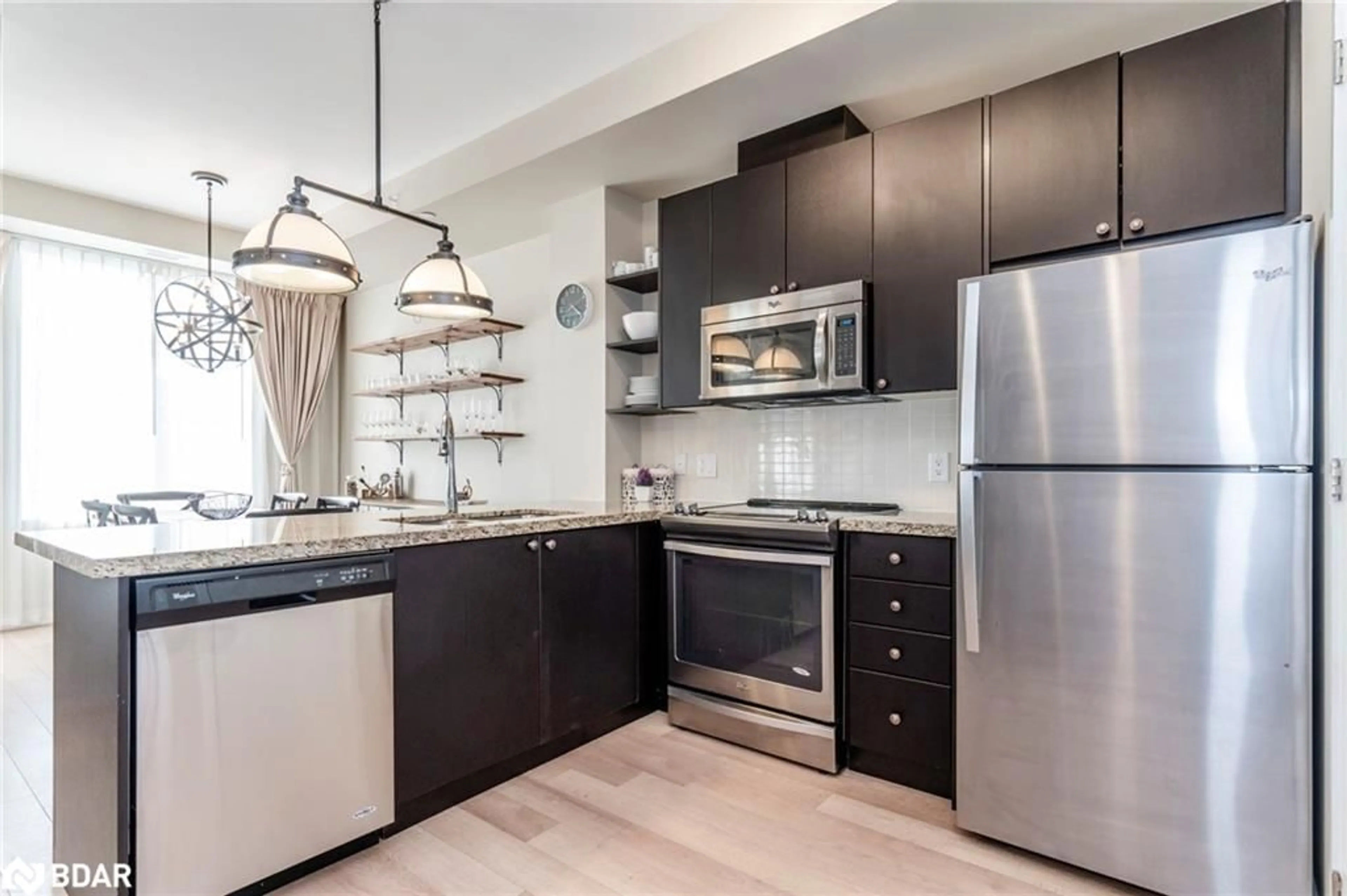 Open concept kitchen, unknown for 40 Horseshoe Boulevard Blvd #207, Oro-Medonte Ontario L4M 4Y8