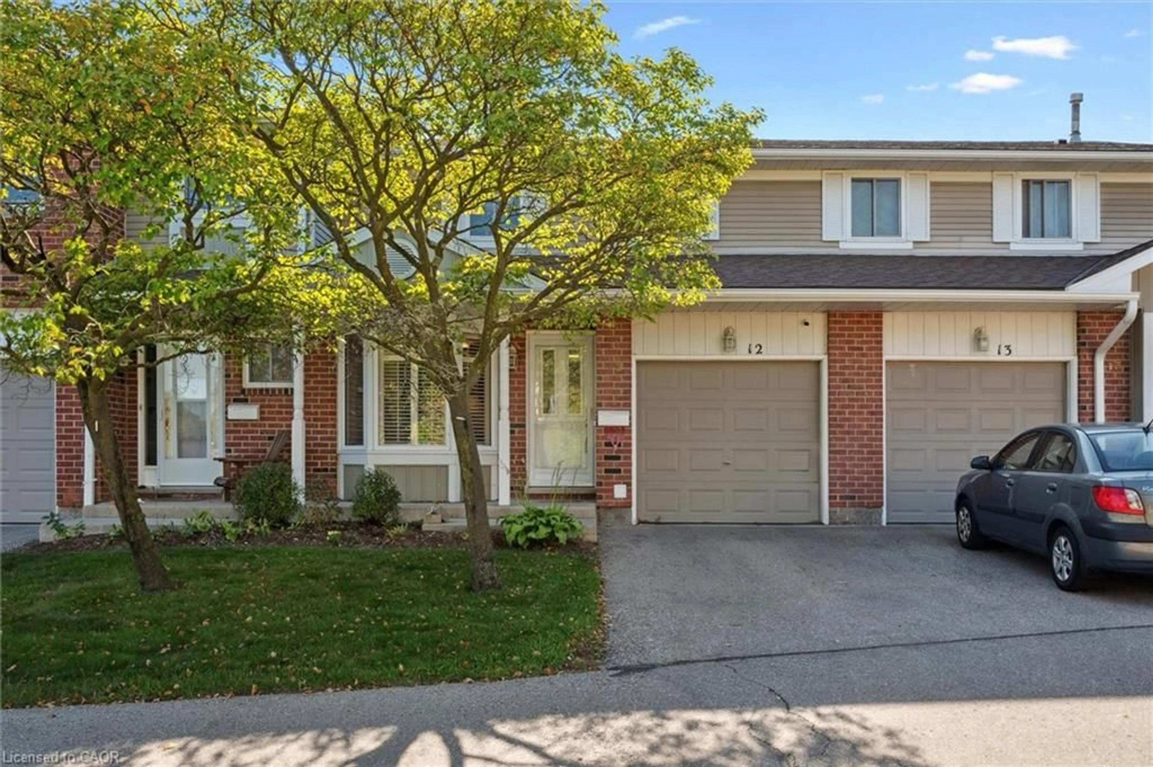 Home with brick exterior material, street for 210 Highland Cres #12, Kitchener Ontario N2M 5H7