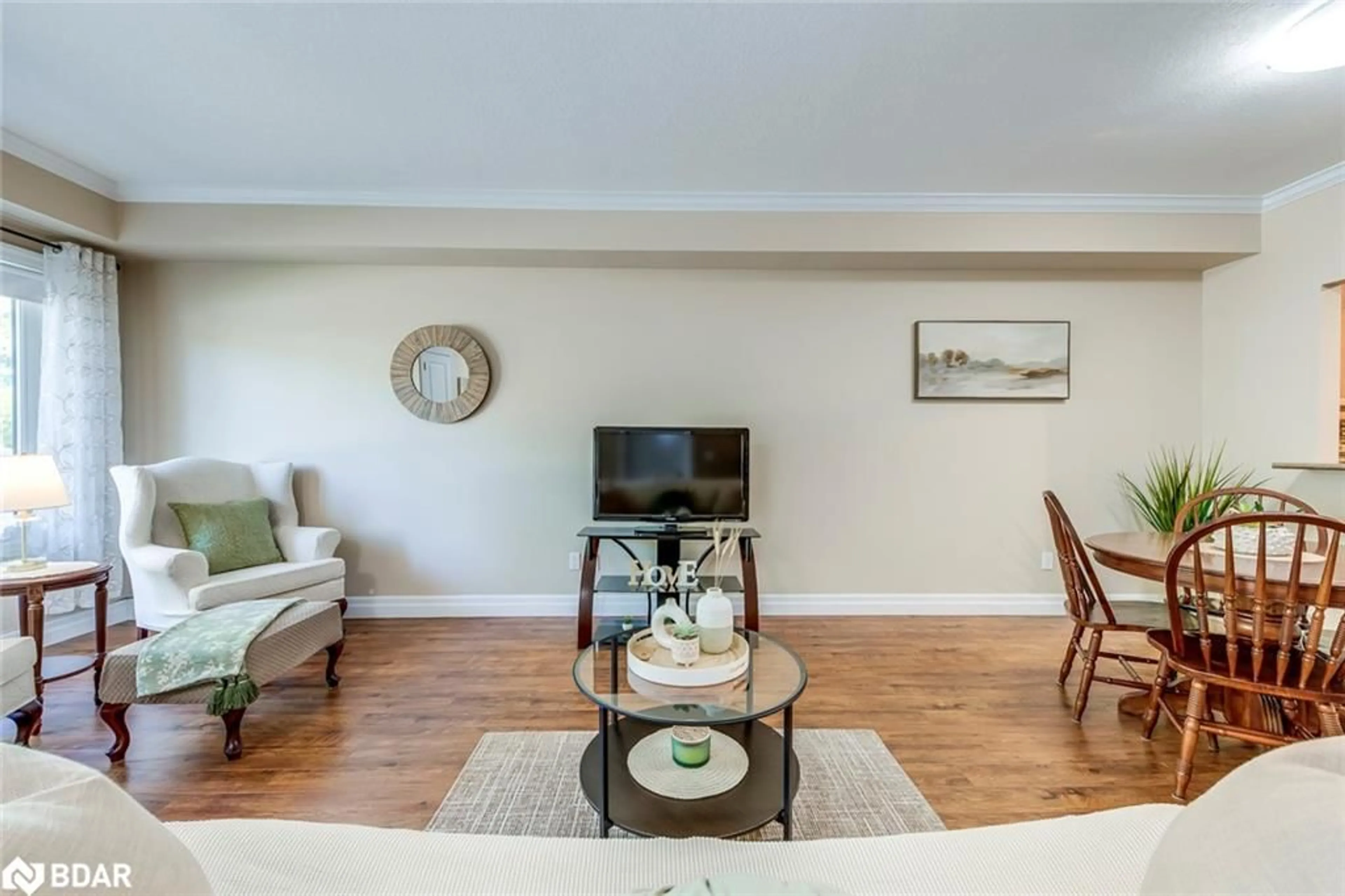 Living room with furniture, wood/laminate floor for 760 Woodhill Dr #221, Fergus Ontario N1M 3W5