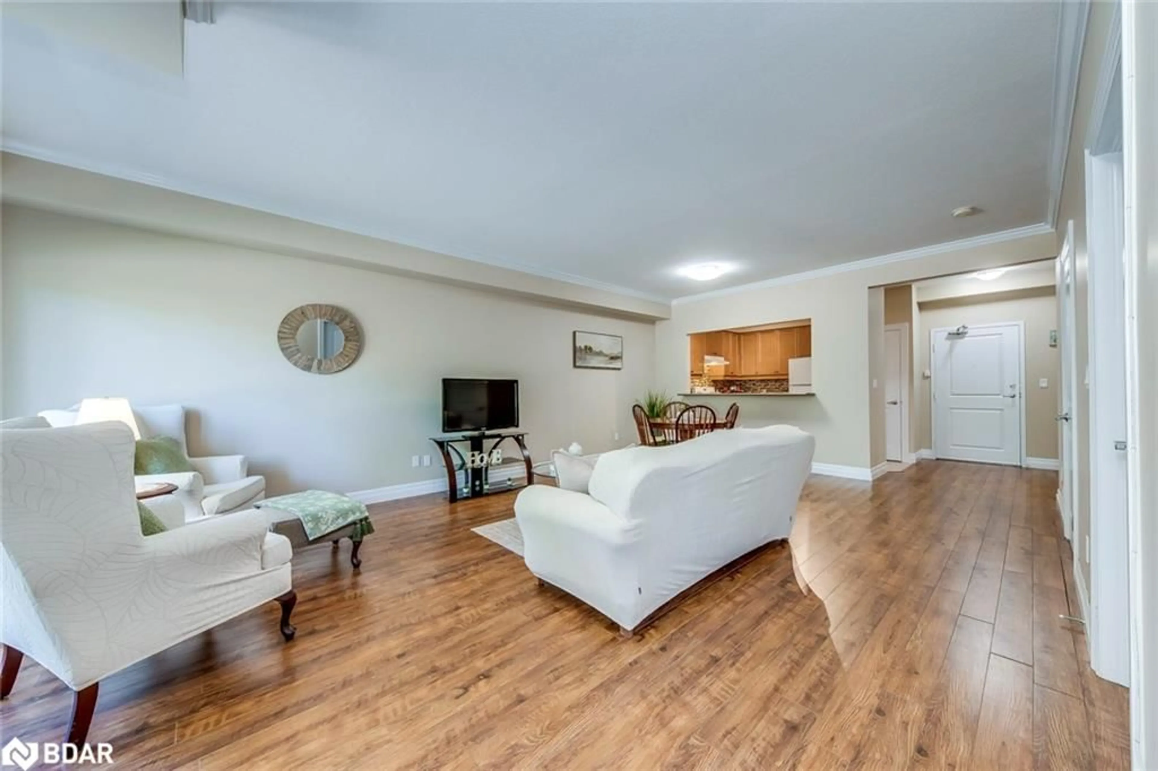 Living room with furniture, wood/laminate floor for 760 Woodhill Dr #221, Fergus Ontario N1M 3W5