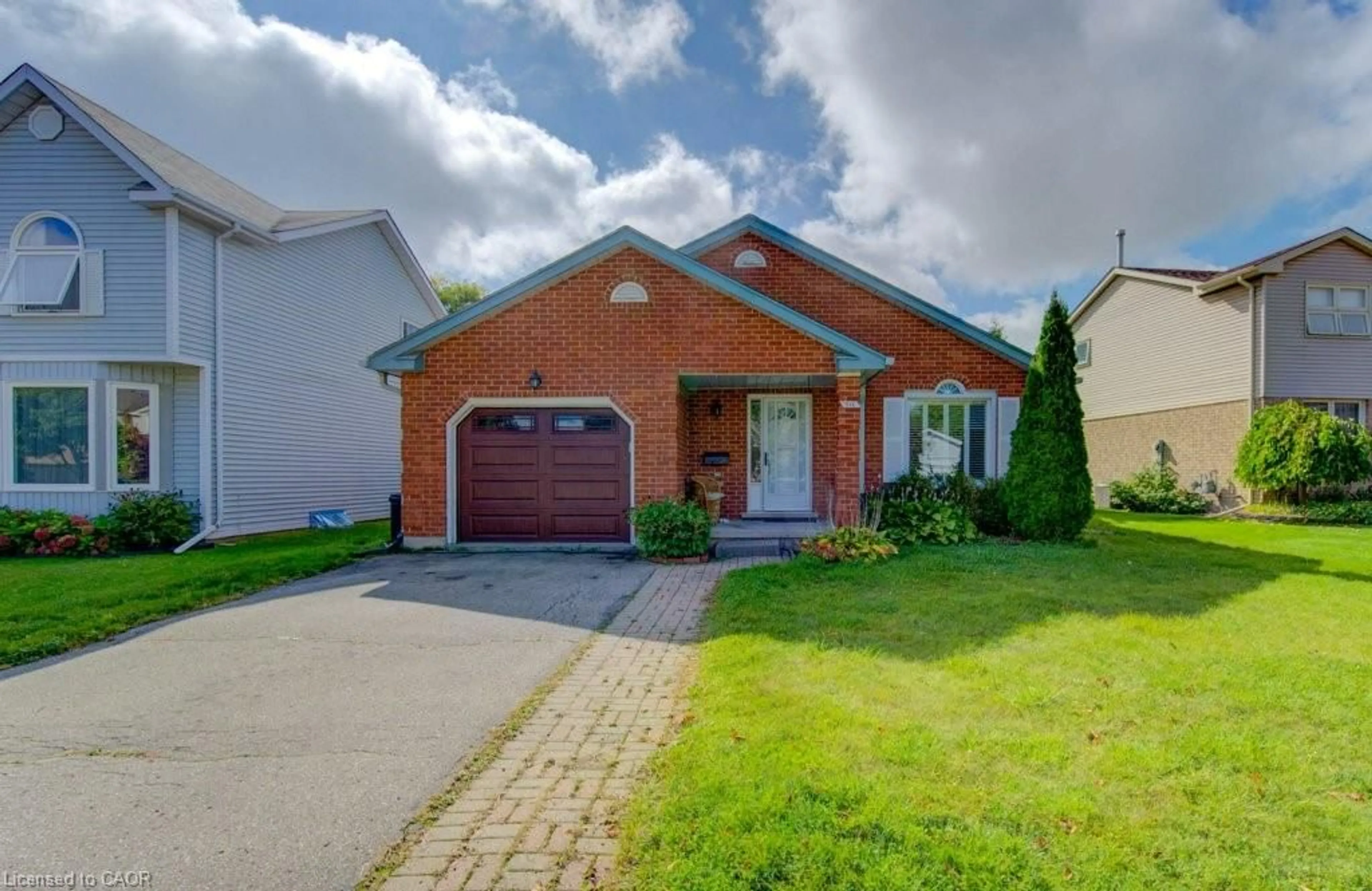 Home with brick exterior material, street for 511 Thorndale Dr, Waterloo Ontario N2T 2A2