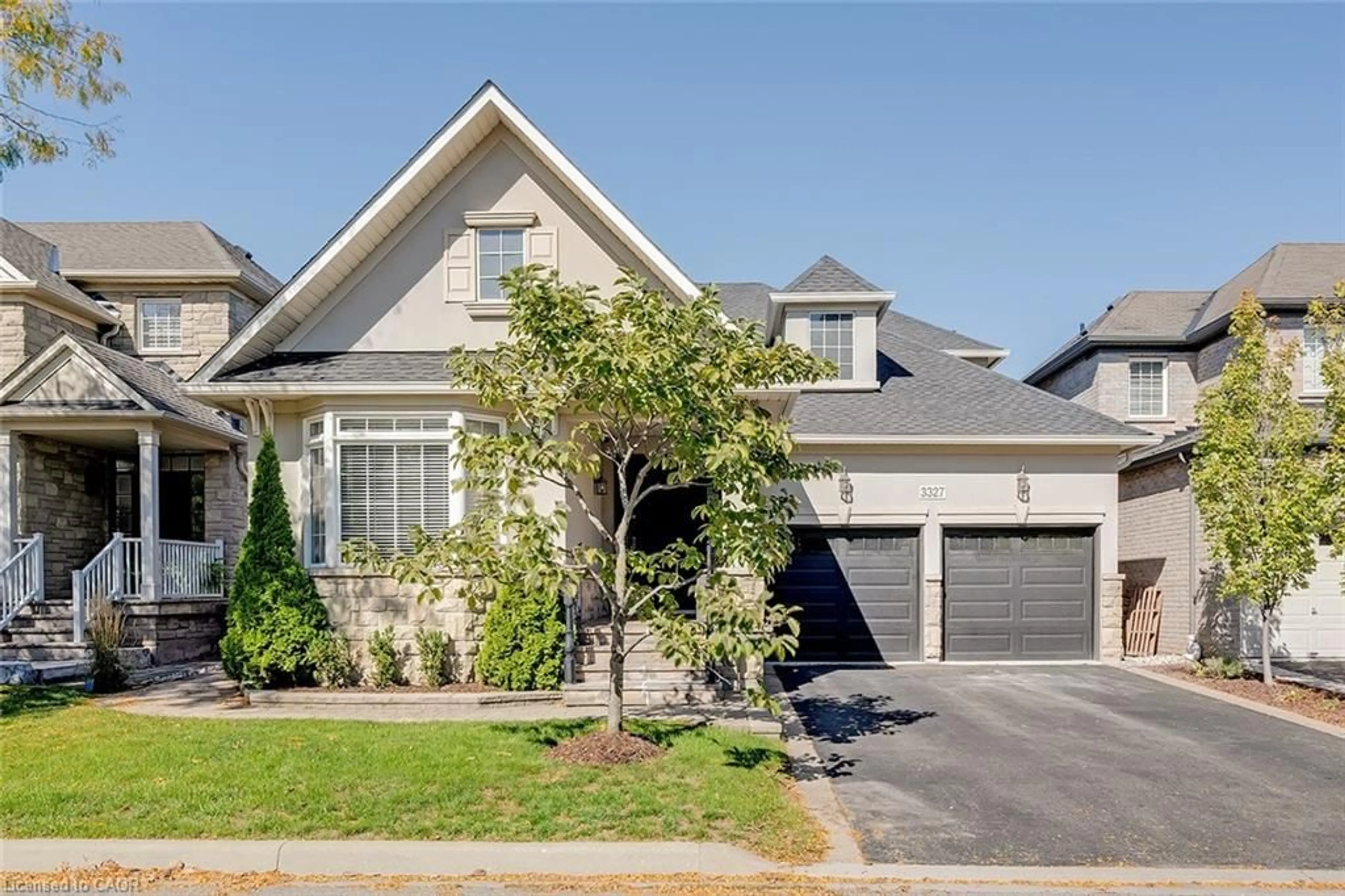 Home with brick exterior material, street for 3327 Skipton Lane, Oakville Ontario L6M 0K3