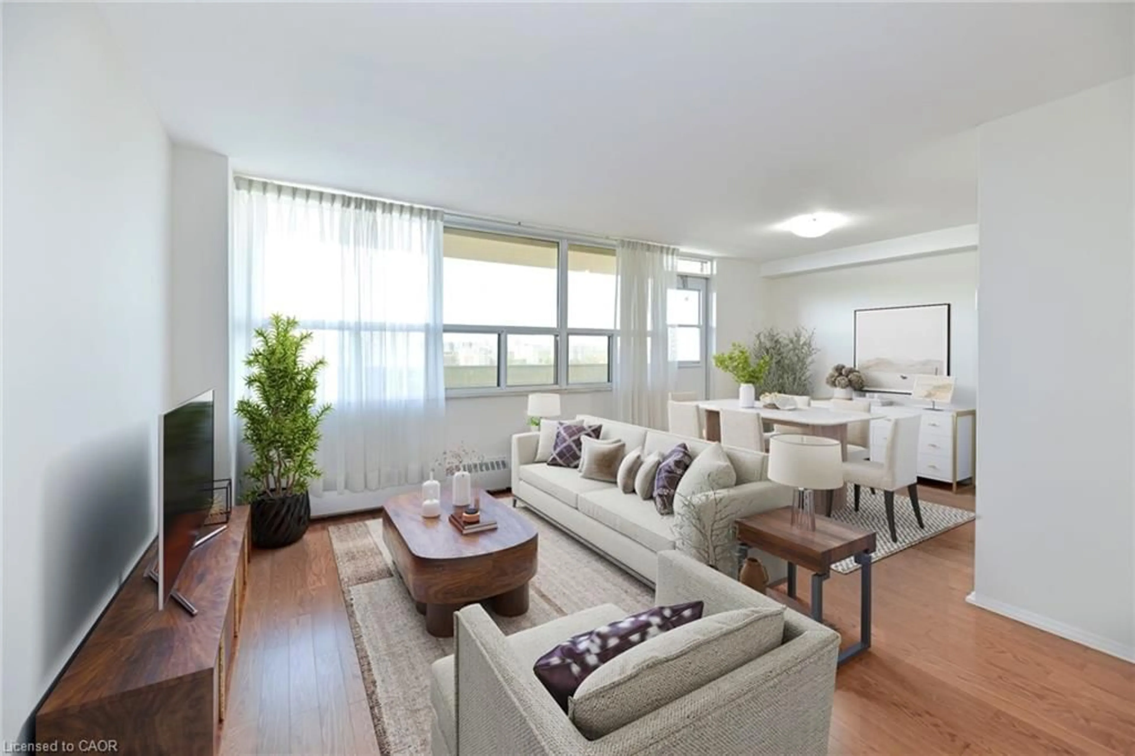 Living room with furniture, wood/laminate floor for 270 Palmdale Dr #1601, Scarborough Ontario M1T 3N8