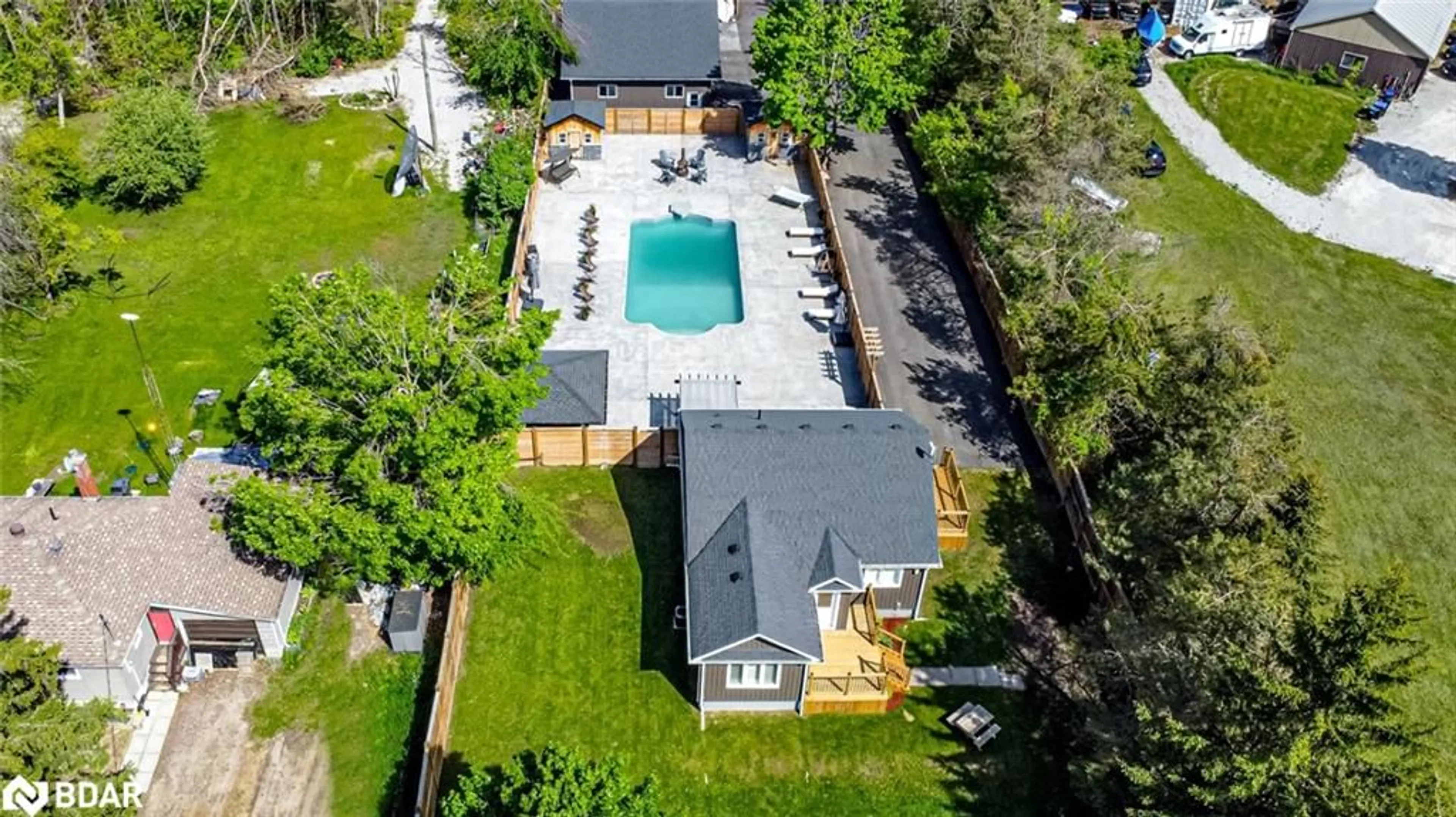 A pic from outside/outdoor area/front of a property/back of a property/a pic from drone, street for 2484 Highway 11, Oro-Medonte Ontario L0L 2E0