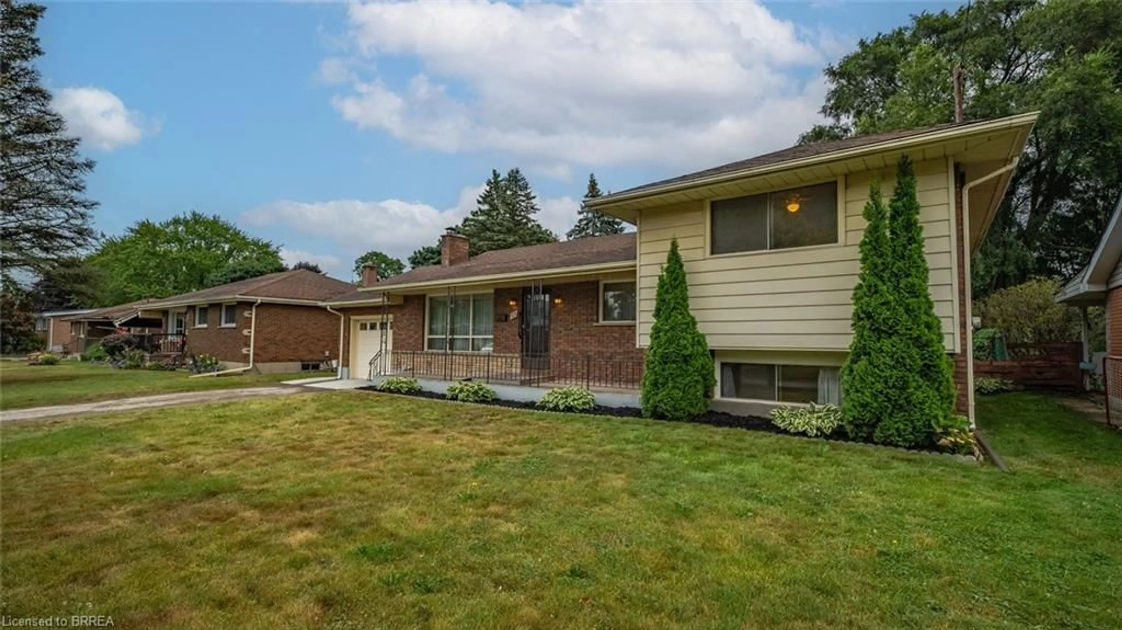 Home with brick exterior material, street for 25 Kensington Ave, Brantford Ontario N3R 3N6