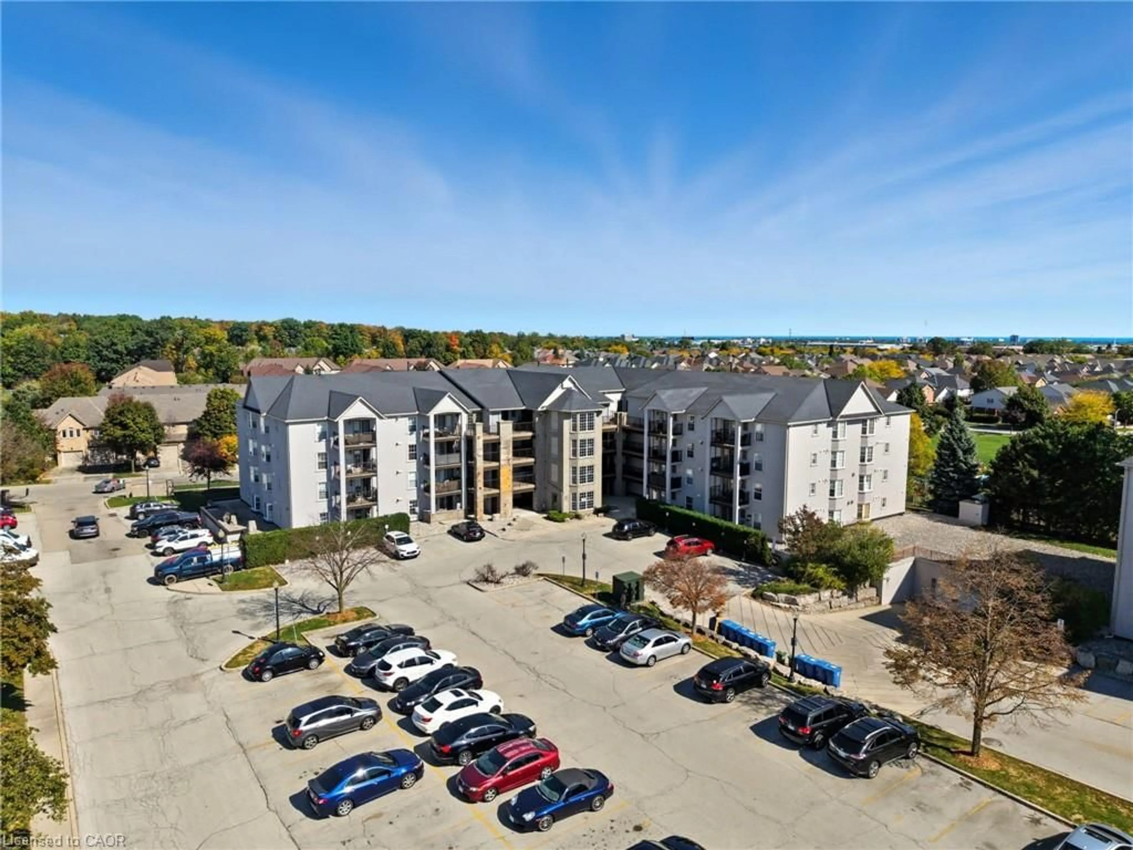 A pic from outside/outdoor area/front of a property/back of a property/a pic from drone, building for 1421 Walkers Line #304, Burlington Ontario L7M 4P4
