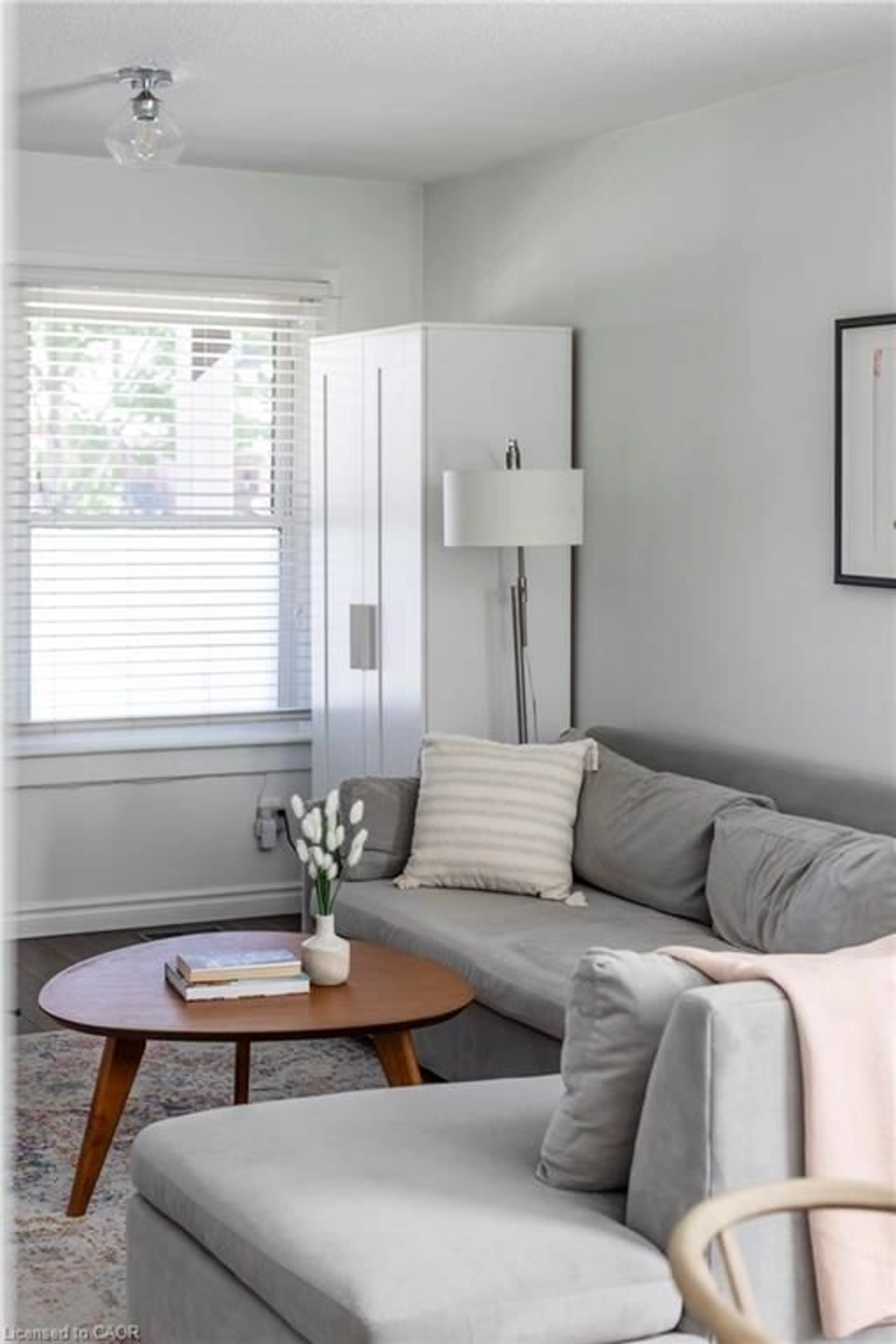 Living room with furniture, wood/laminate floor for 68 Graham Ave, Hamilton Ontario L8K 2M1