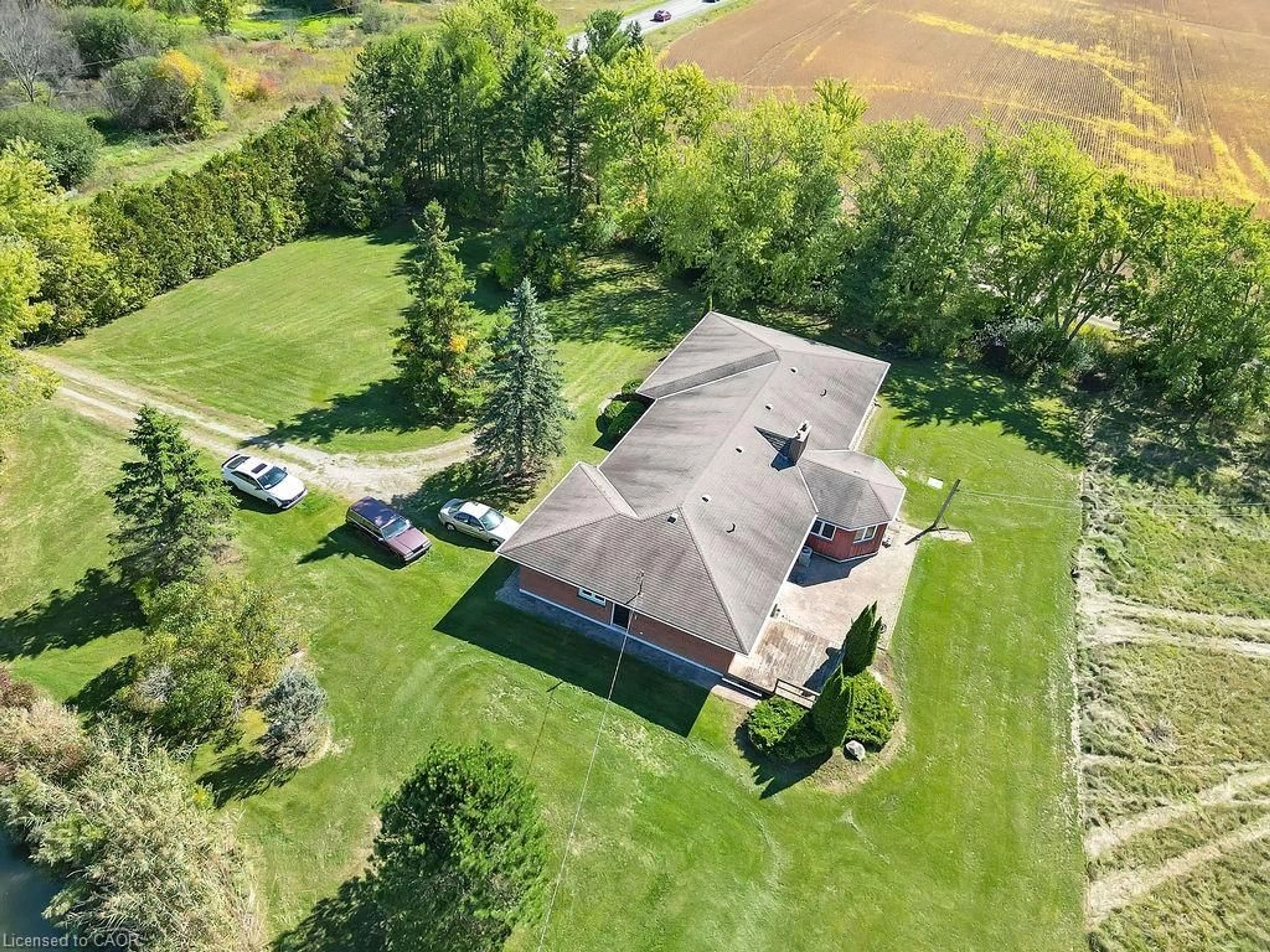 A pic from outside/outdoor area/front of a property/back of a property/a pic from drone, unknown for 585 Junction Rd, Canfield Ontario N0A 1C0