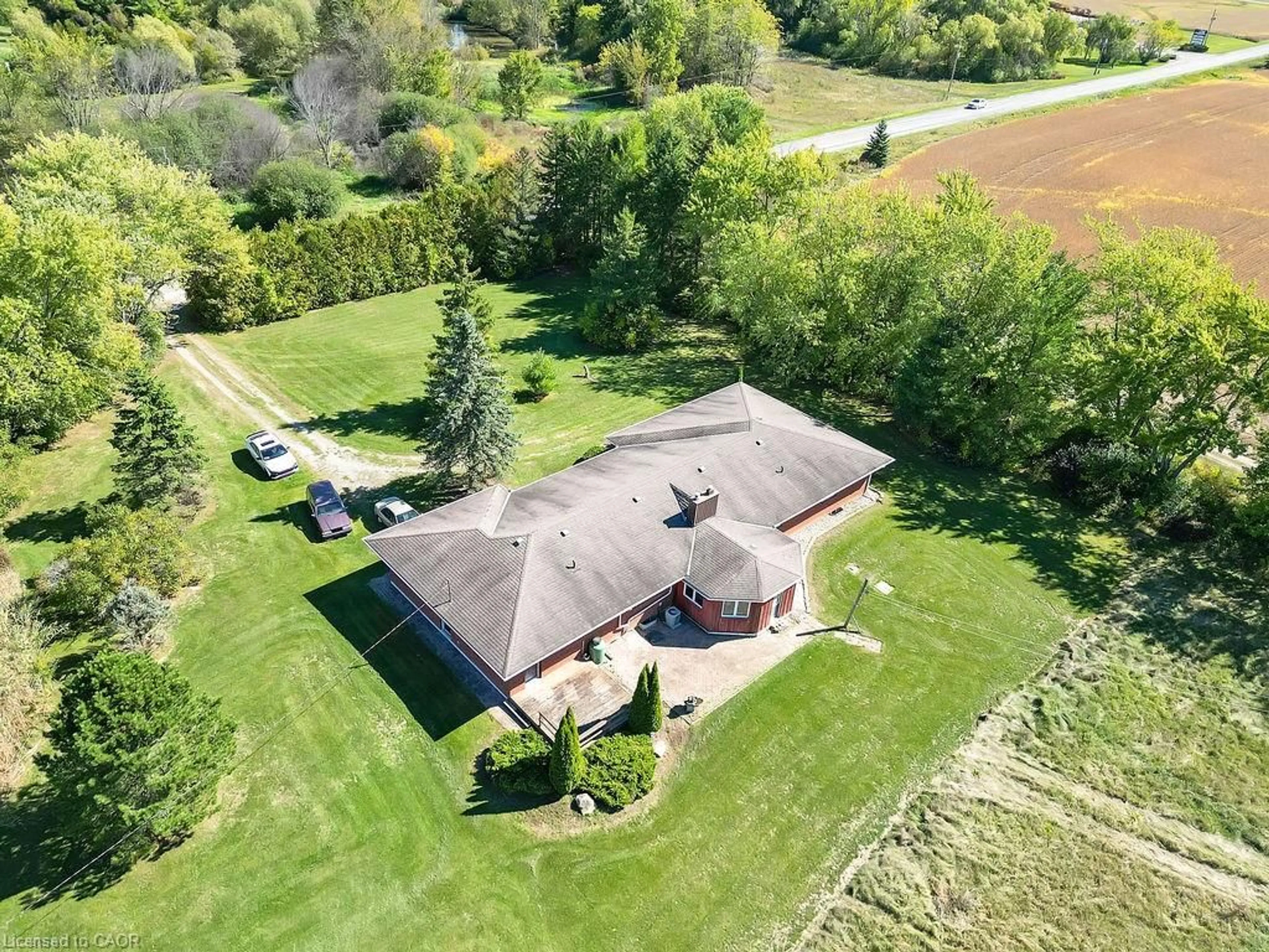 A pic from outside/outdoor area/front of a property/back of a property/a pic from drone, unknown for 585 Junction Rd, Canfield Ontario N0A 1C0
