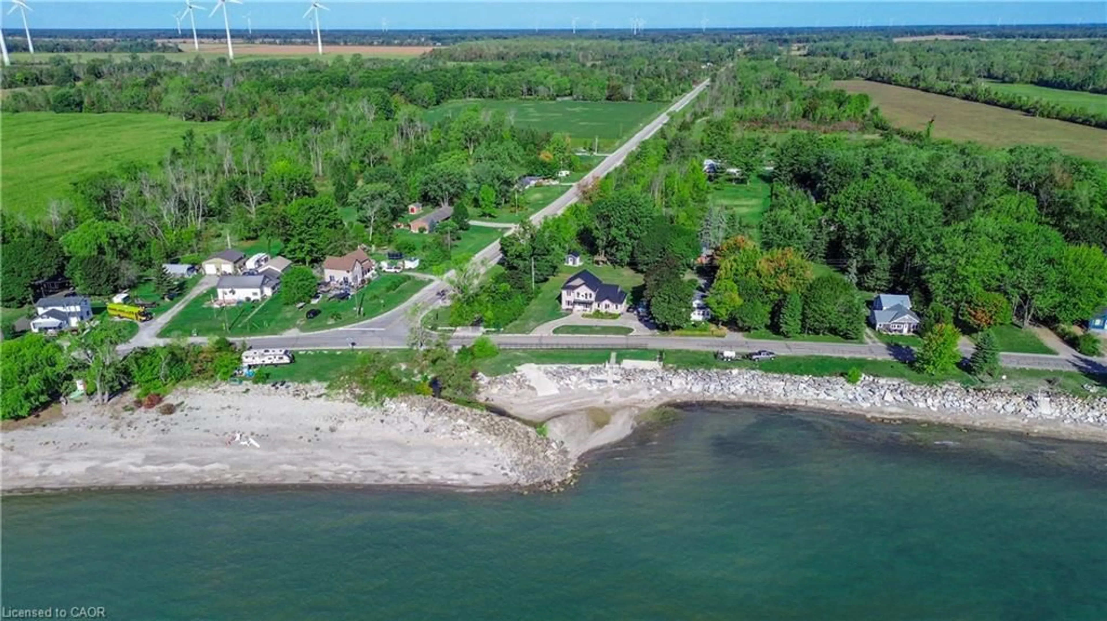 A pic from outside/outdoor area/front of a property/back of a property/a pic from drone, water/lake/river/ocean view for 2801 North Shore Dr, Lowbanks Ontario N0A 1K0