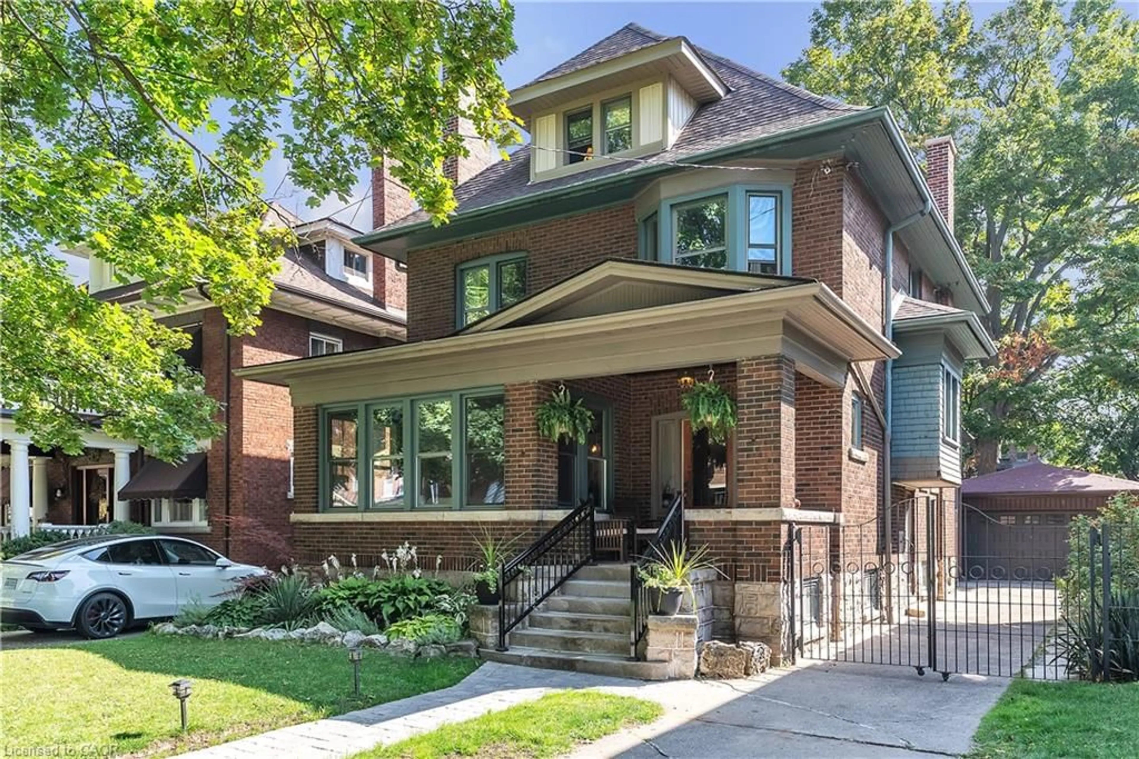 Home with brick exterior material, street for 121 St Clair Ave, Hamilton Ontario L8M 2N8