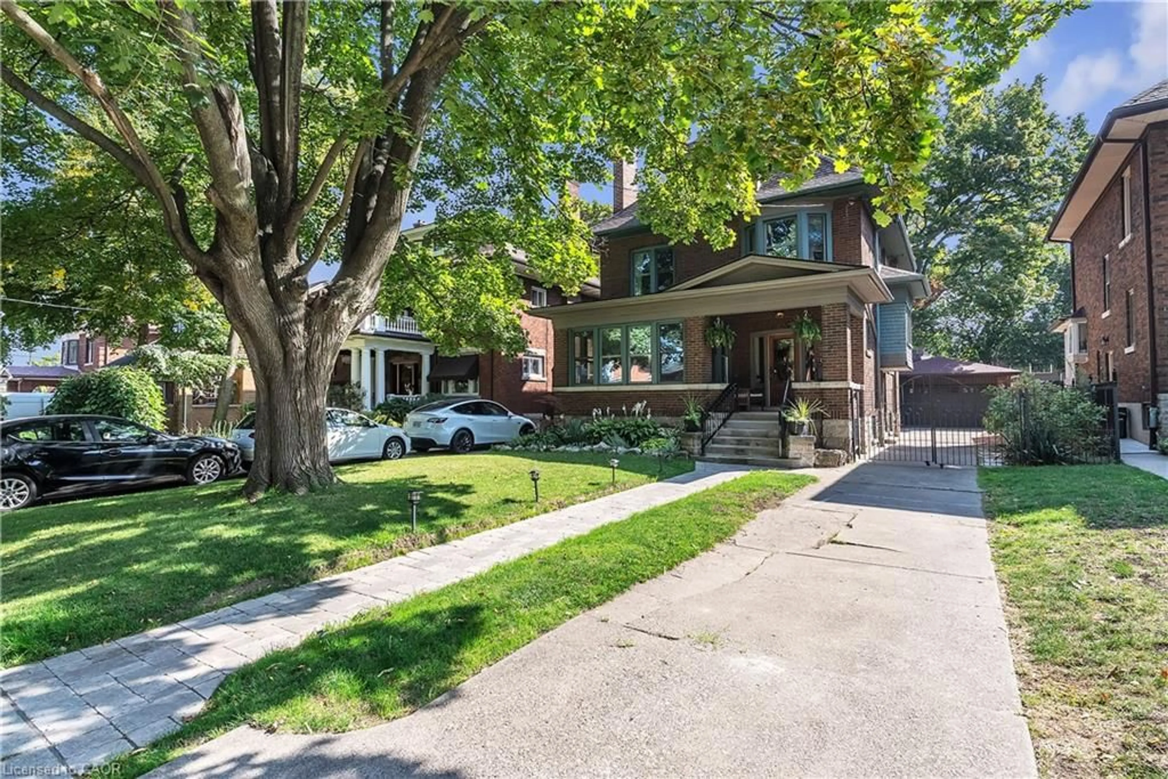 Home with brick exterior material, street for 121 St Clair Ave, Hamilton Ontario L8M 2N8