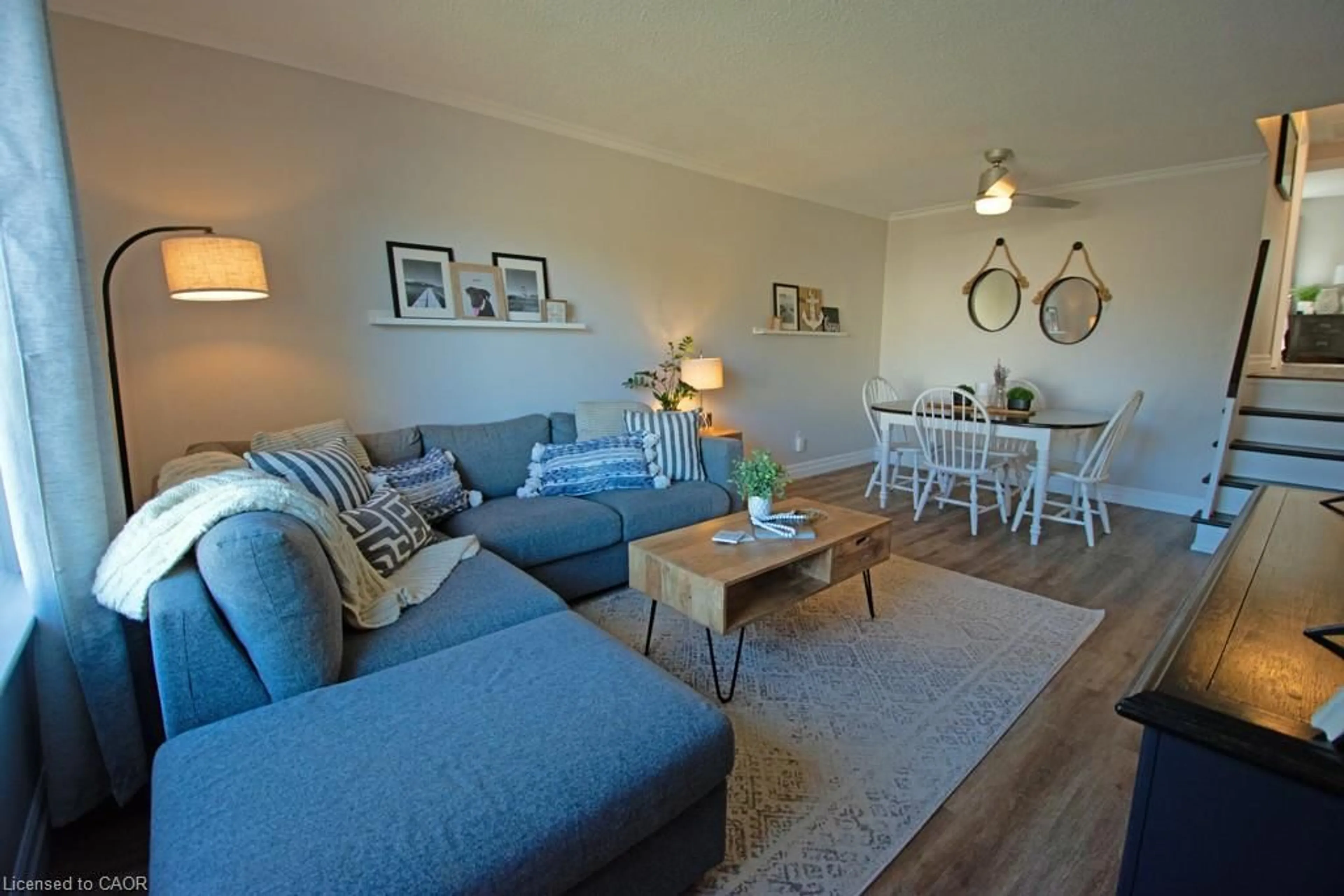Living room with furniture, wood/laminate floor for 7 Gaitwin St, Brantford Ontario N3P 1A9