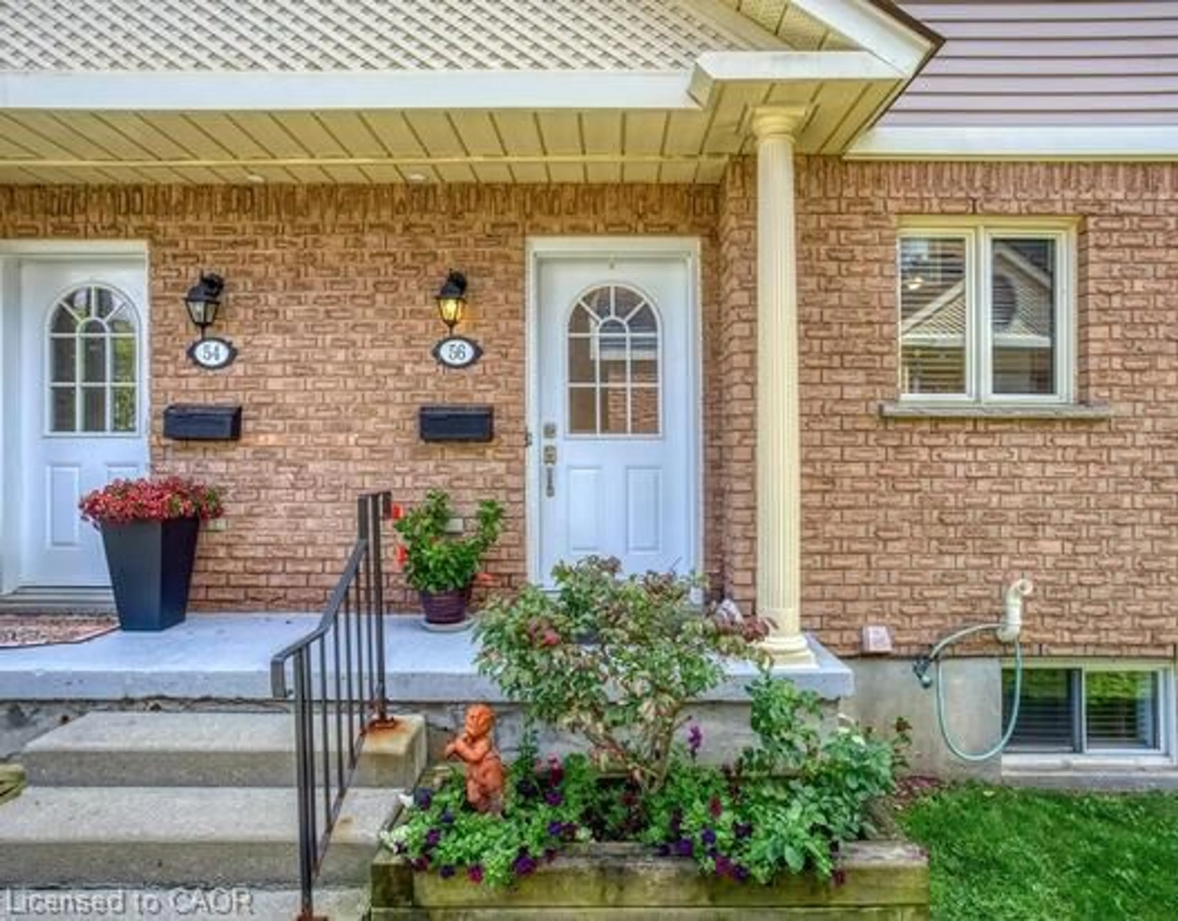 Home with brick exterior material, street for 941 Gordon St #56, Guelph Ontario N1G 4R9