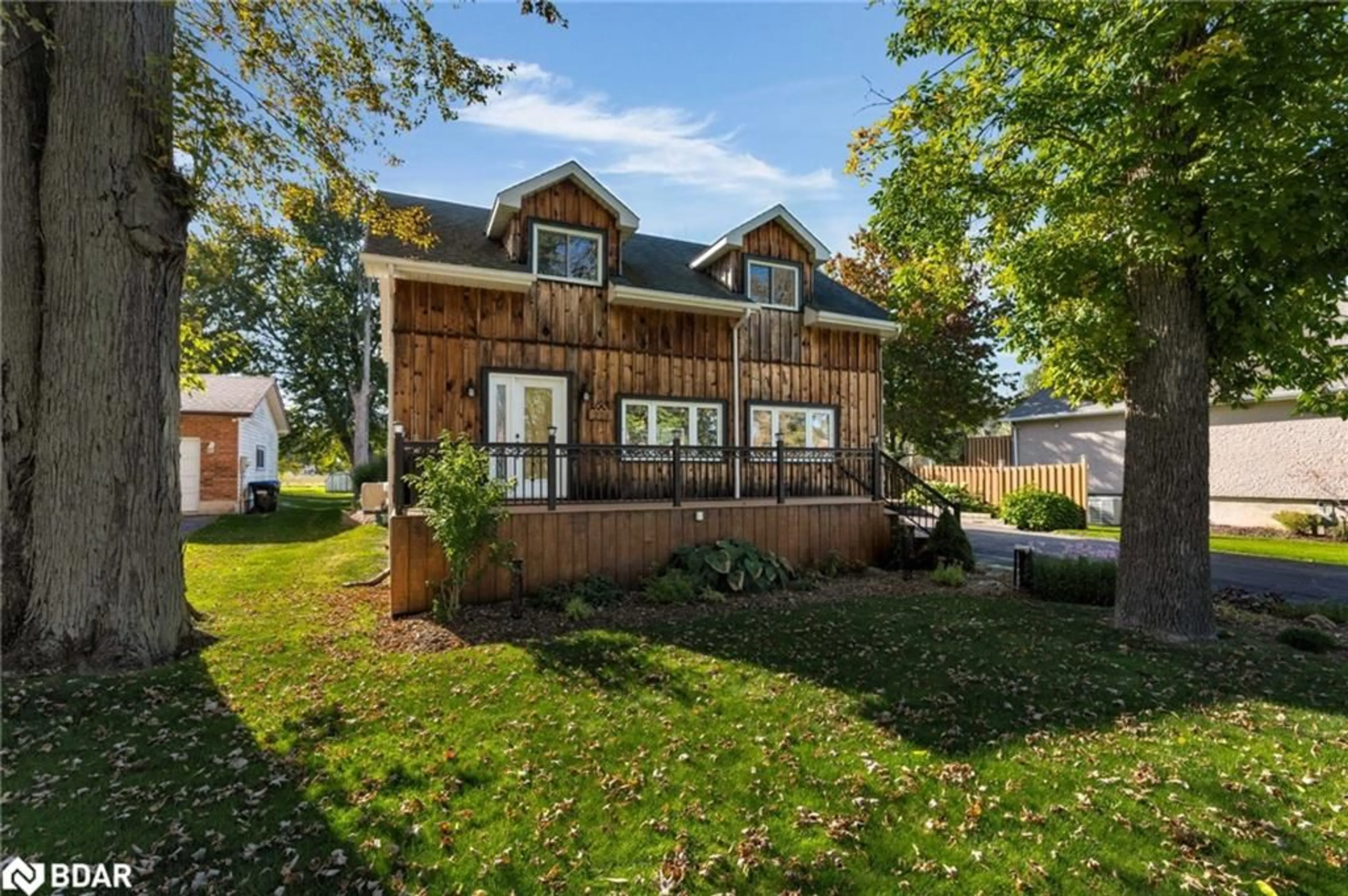 Home with vinyl exterior material, street for 228 Bayshore Rd, Innisfil Ontario L0L 1K0