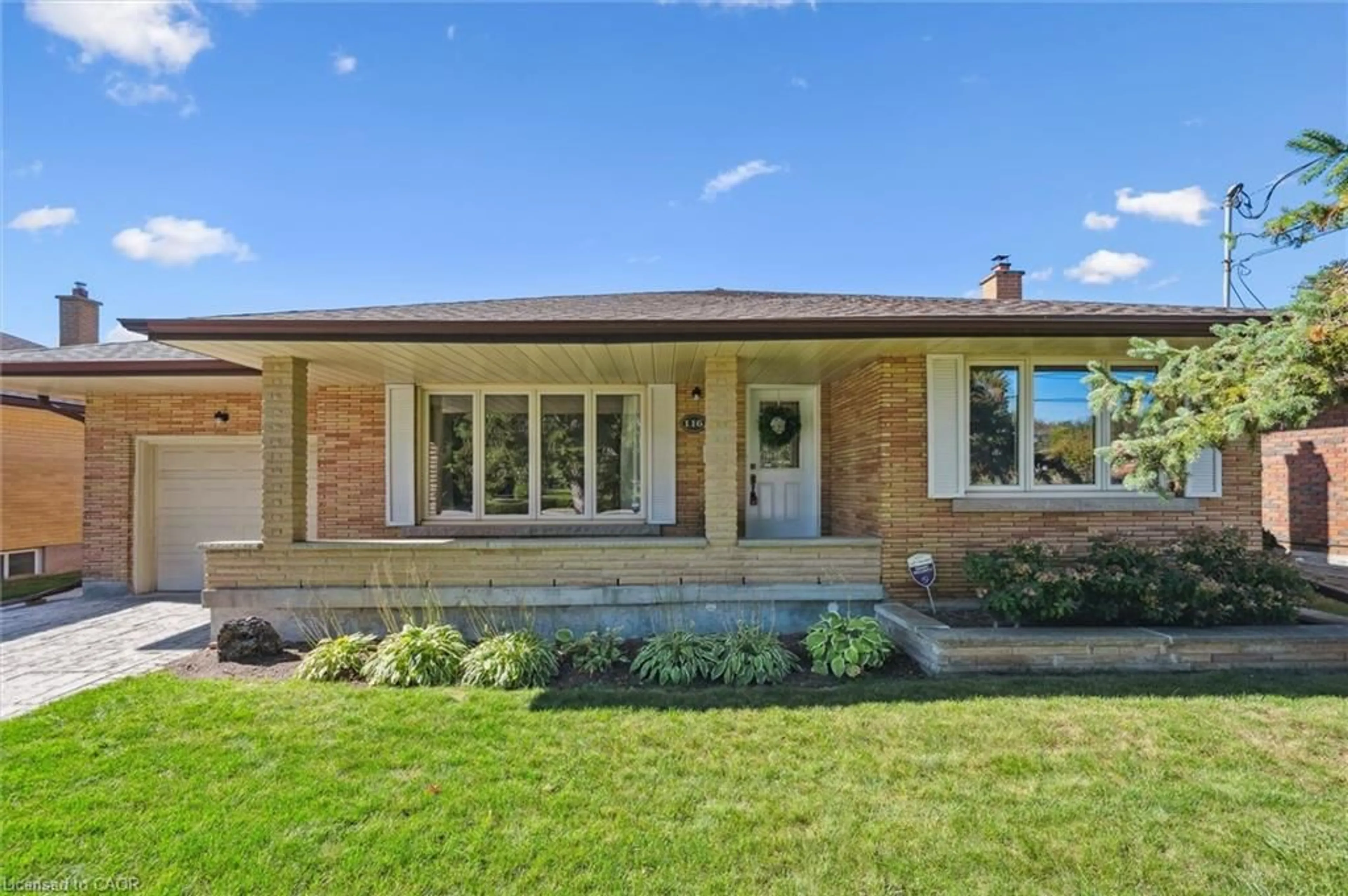 Home with brick exterior material, street for 116 William St, Guelph Ontario N1E 5E9